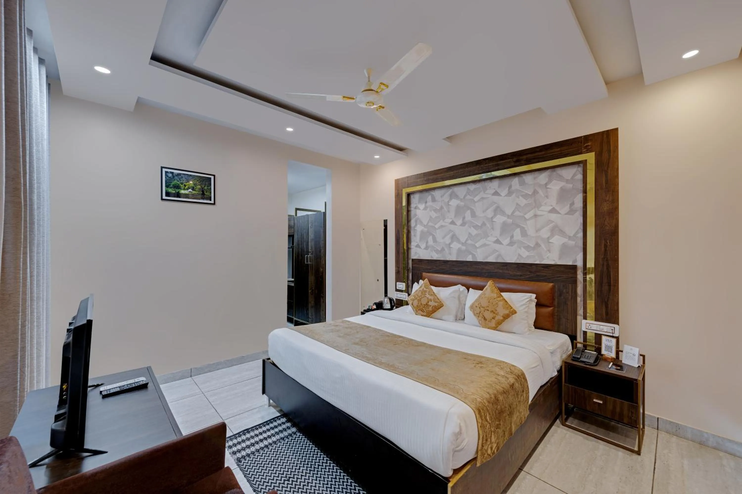 Photo of the whole room, Bed in Golden Rock, Dharamshala - AM Hotel Kollection