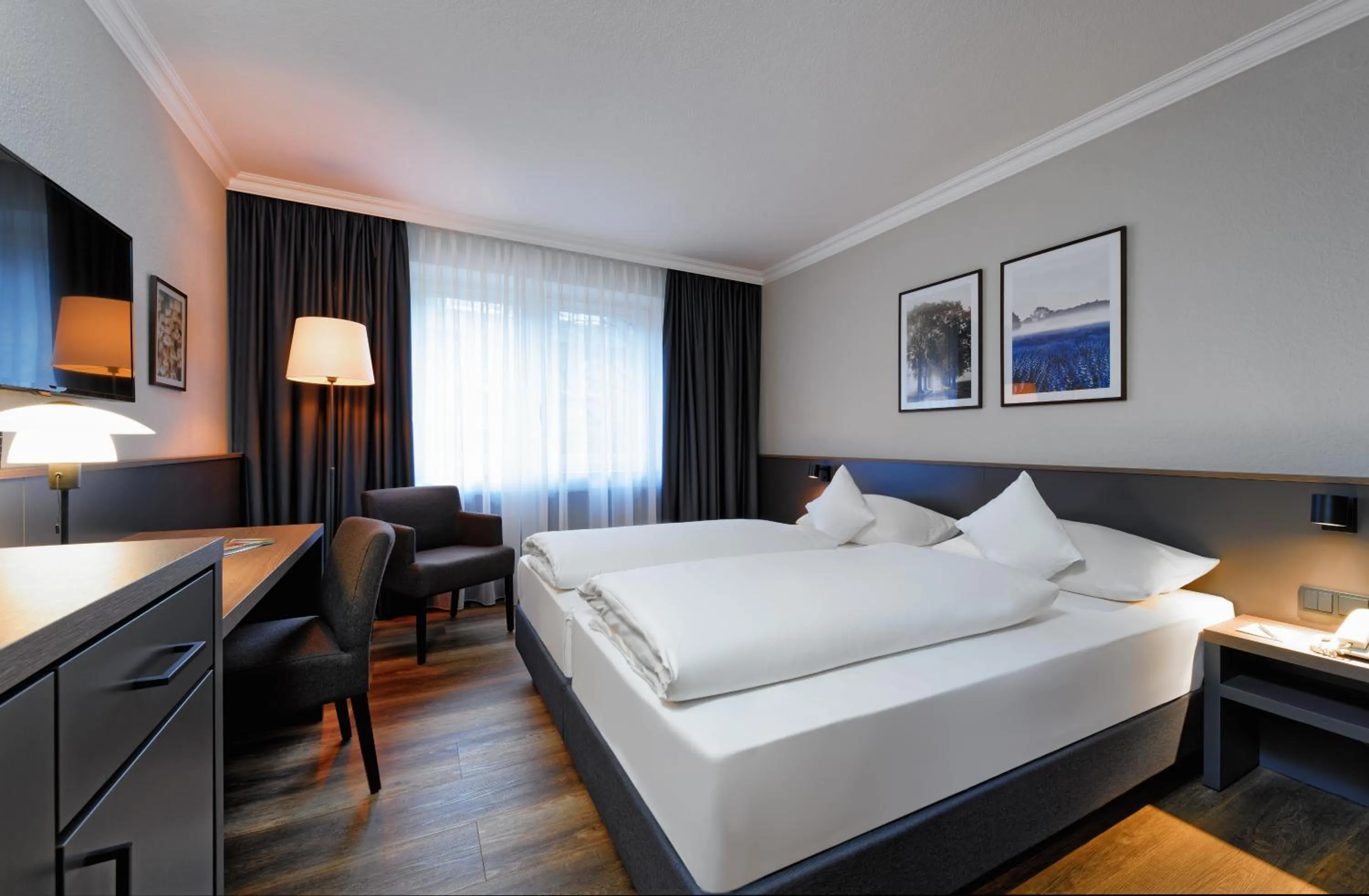 Photo of the whole room, Bed in ATLANTIC Hotel Landgut Horn
