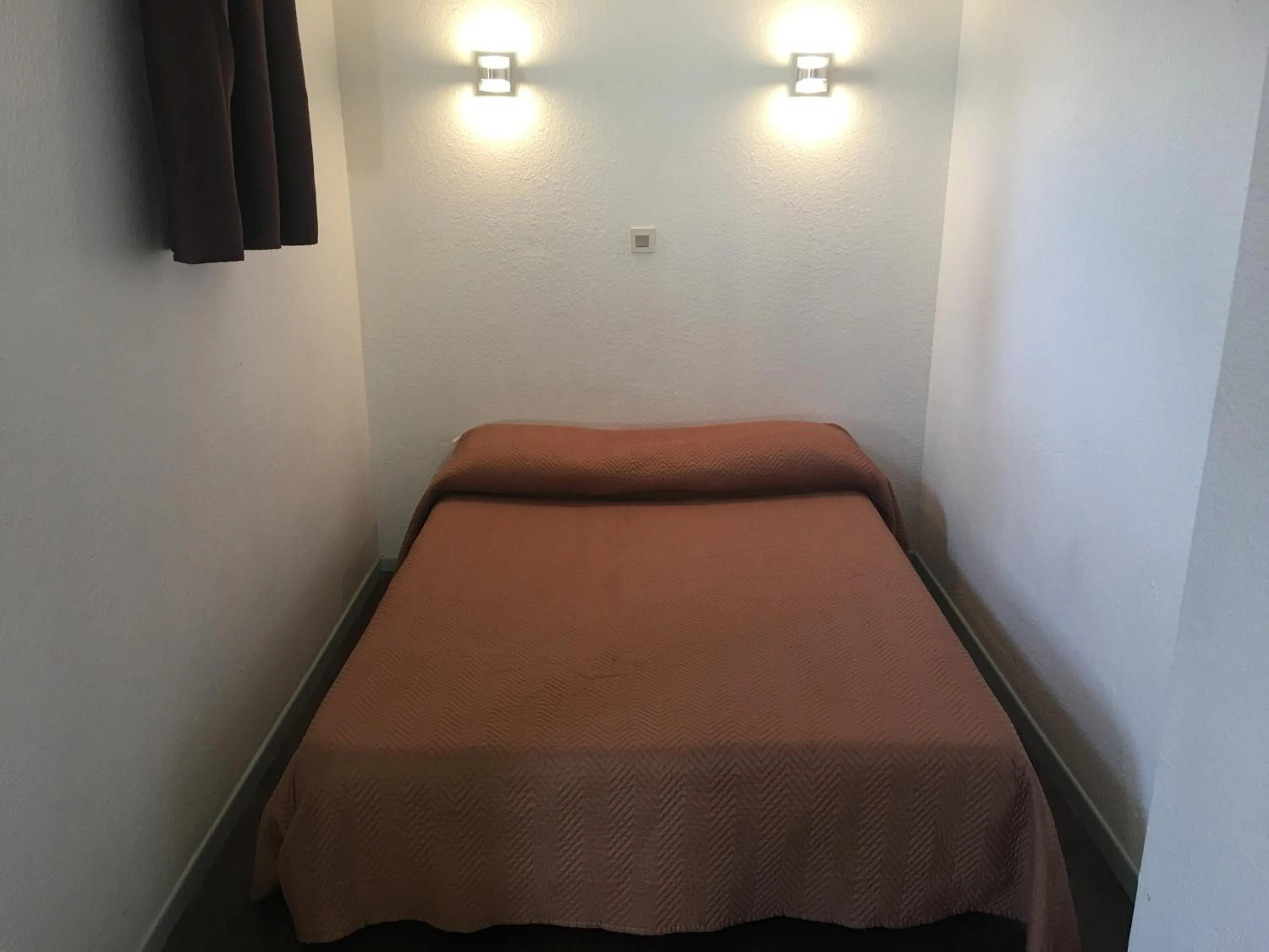 Bed in Hôtel Motelia