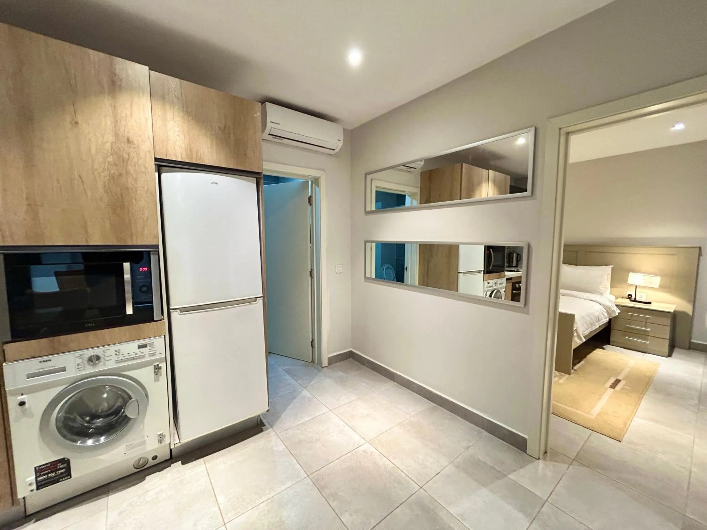 Kitchen or kitchenette, Bed in Forest View Apartments