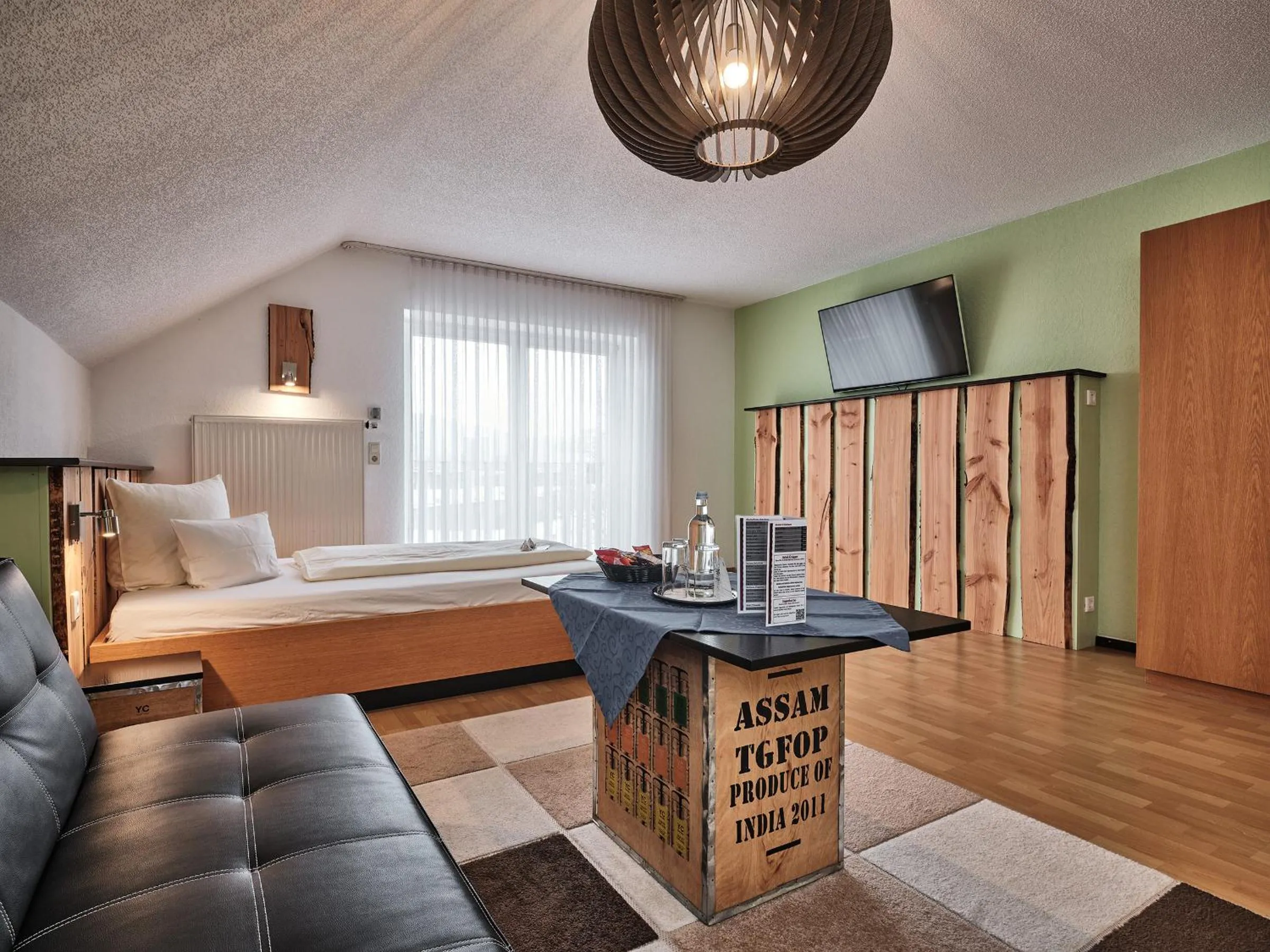 Living room, Bed in TIPTOP Hotel am Hochrhein