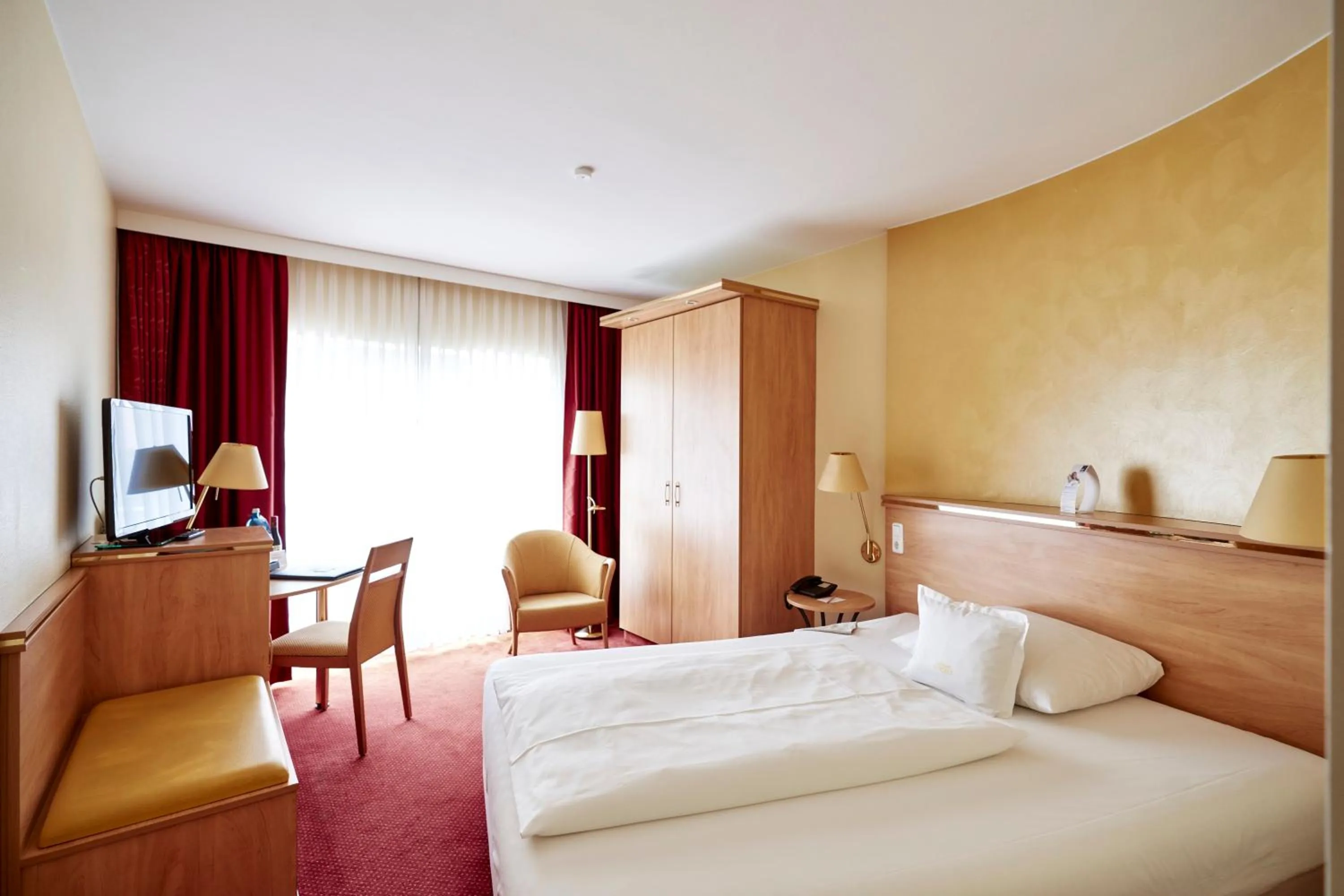 Photo of the whole room, Bed in Ringhotel Gardels