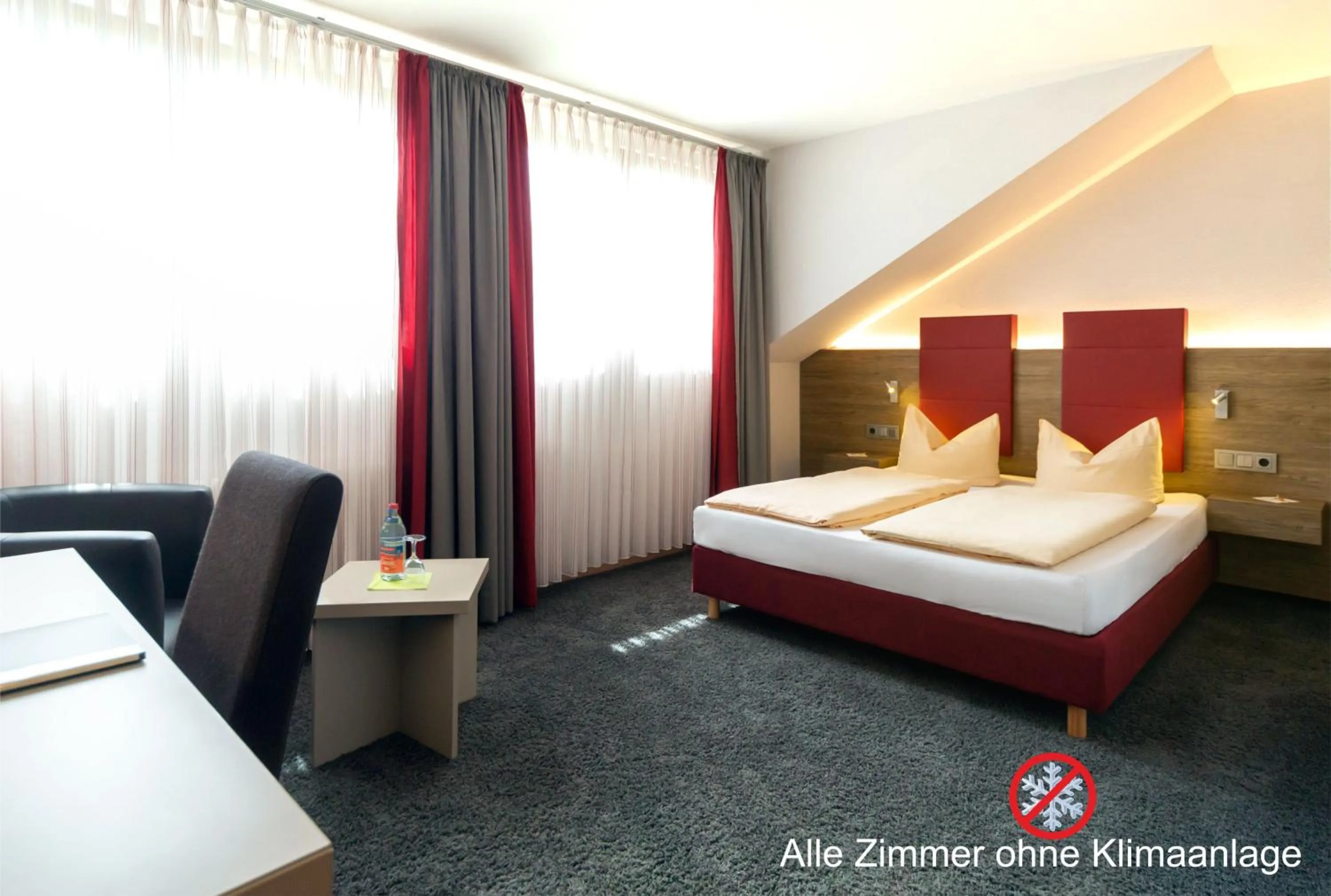 Photo of the whole room, Bed in Hotel-Restaurant Bierhäusle