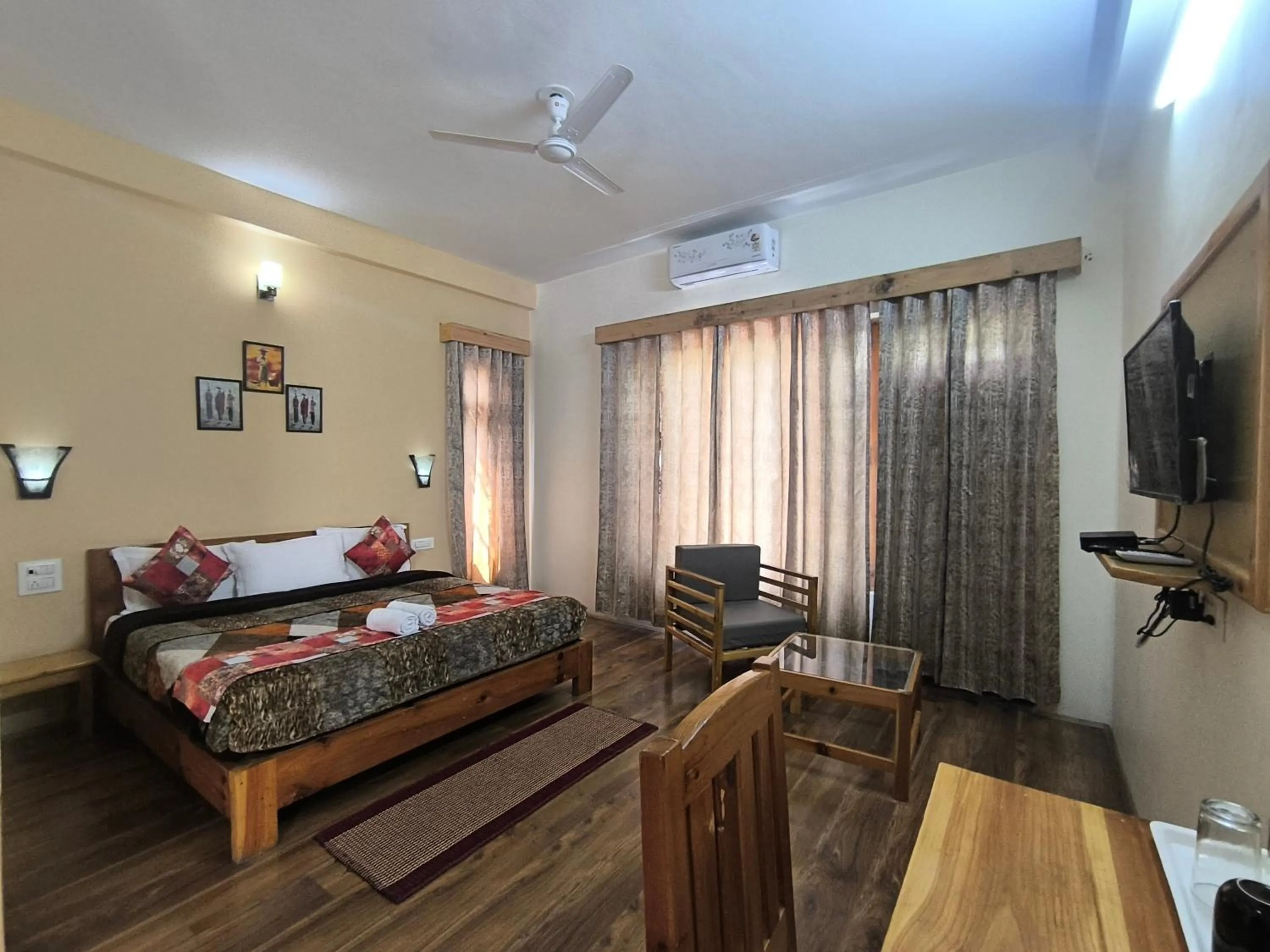 Bed in Tirthan Grand Riverside