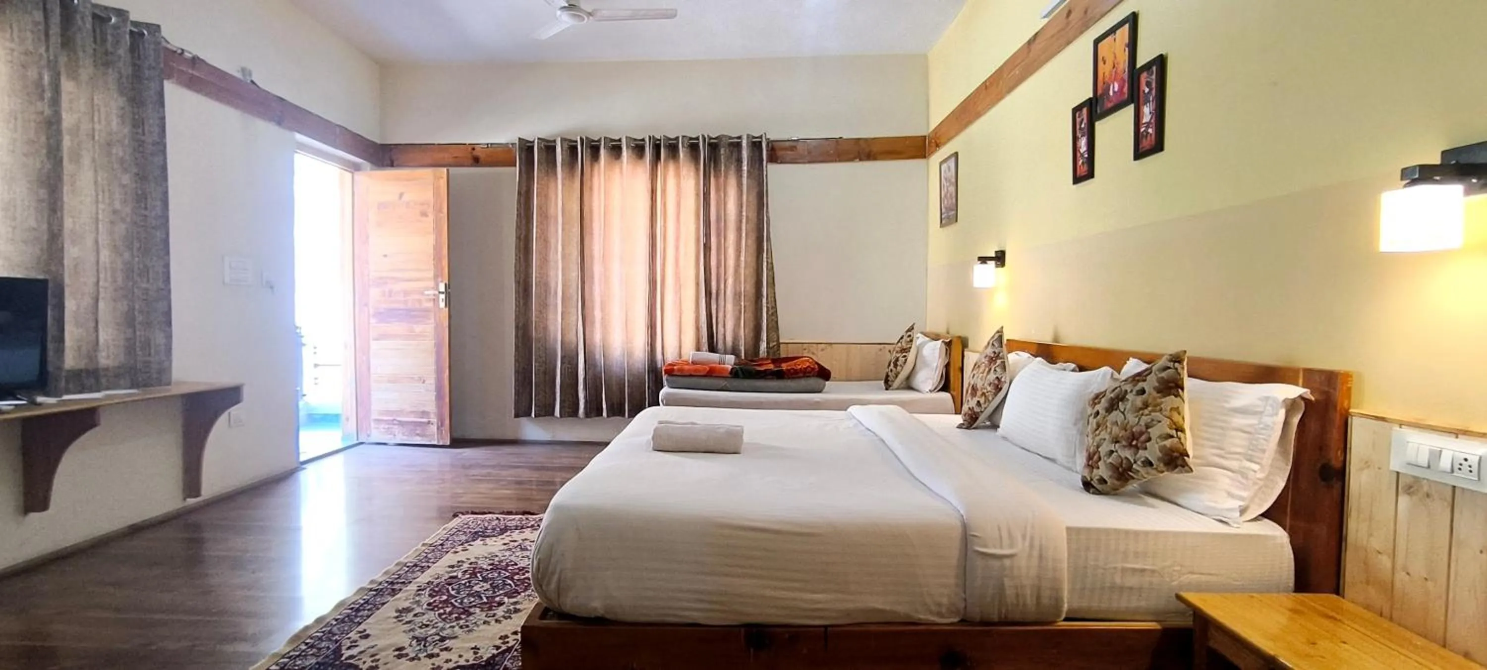 Bed in Tirthan Grand Riverside