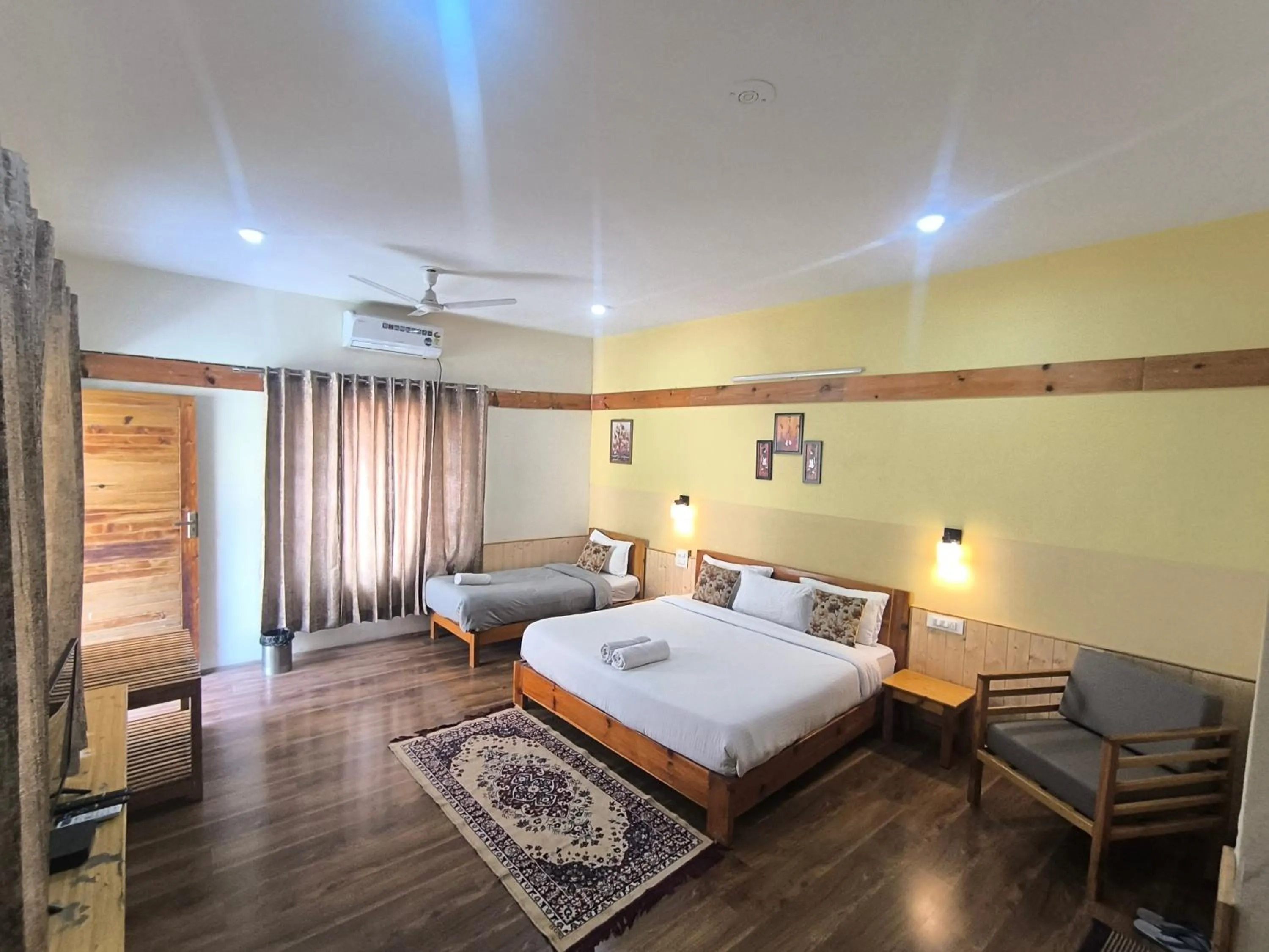 Bed in Tirthan Grand Riverside