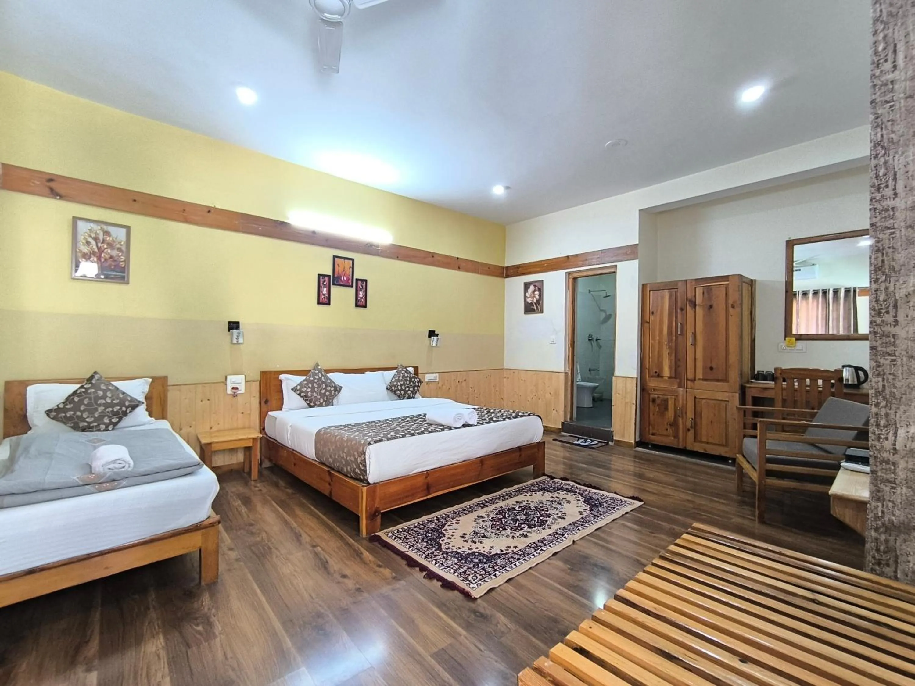 Bed in Tirthan Grand Riverside