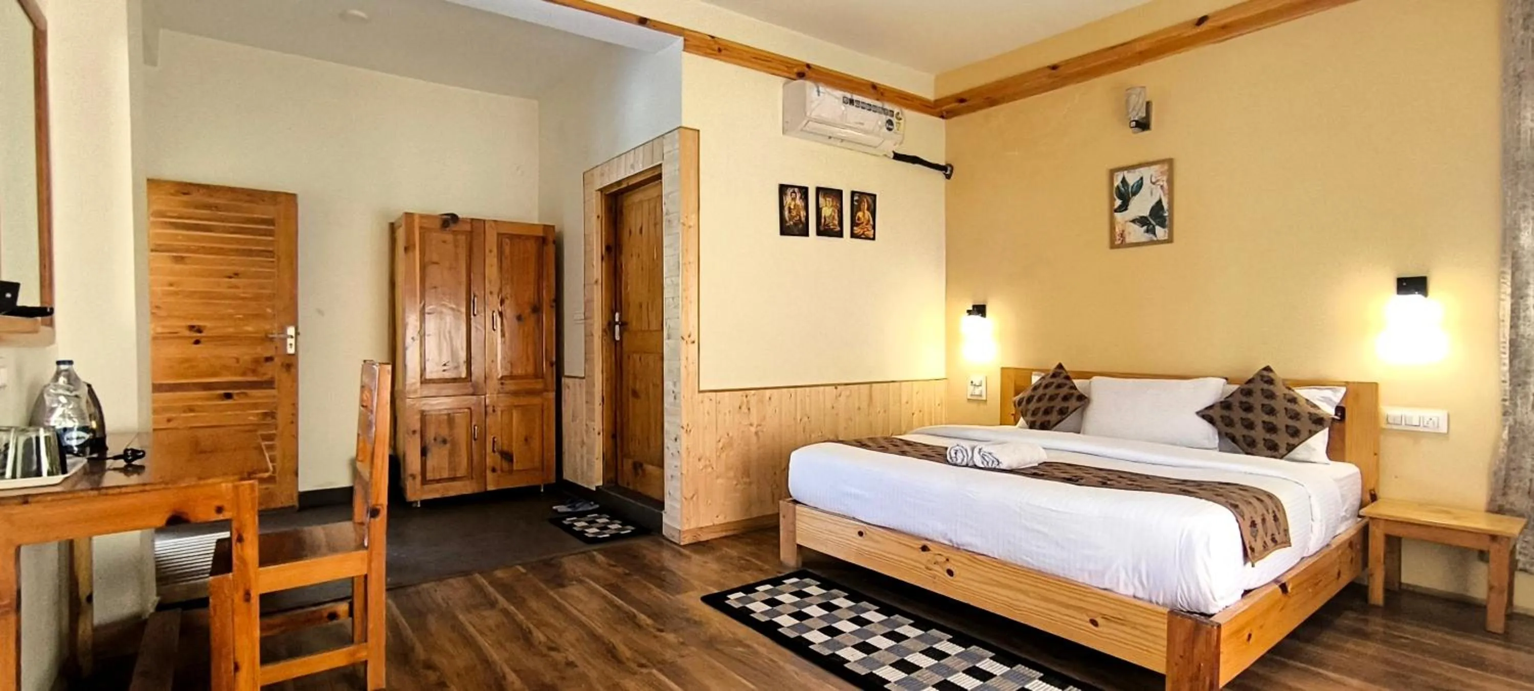 Bed in Tirthan Grand Riverside