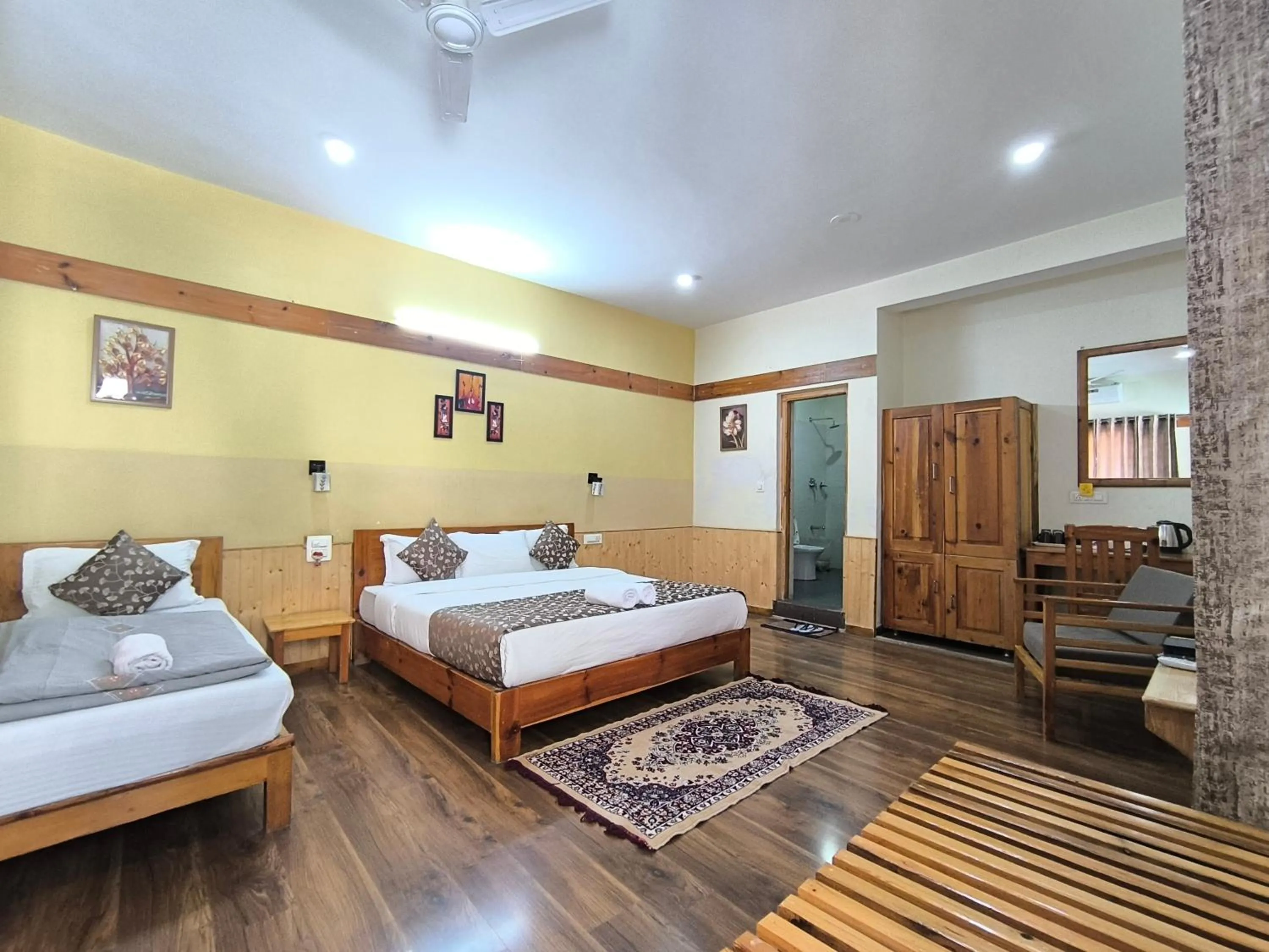 Bed in Tirthan Grand Riverside