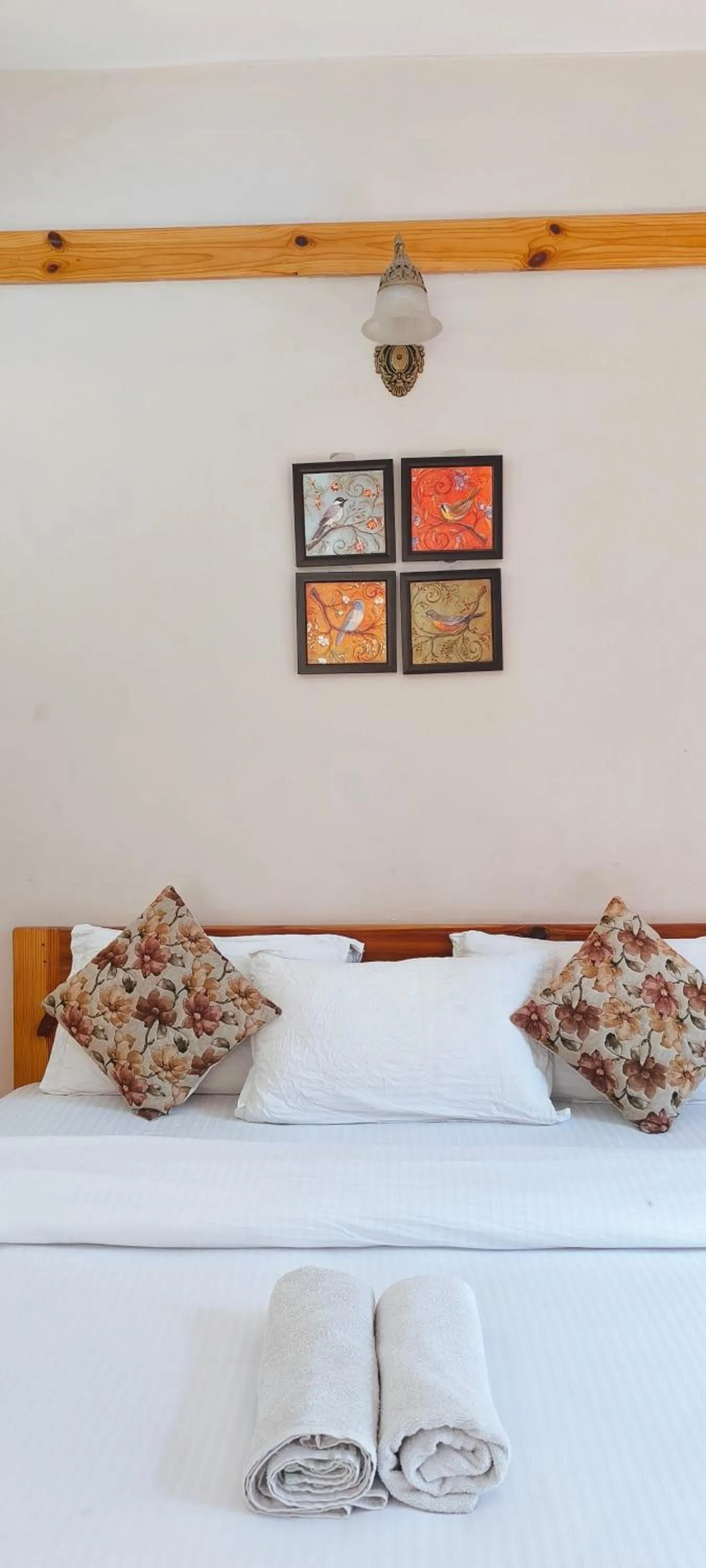 Bed in Tirthan Grand Riverside