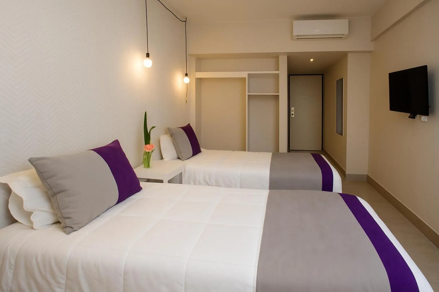 Bed in M Concept Hotel