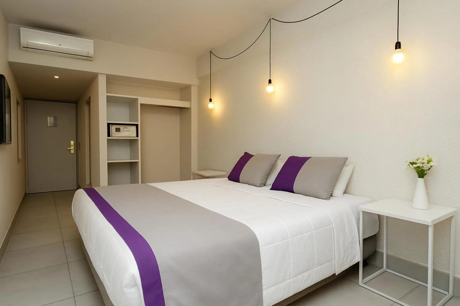 Bed in M Concept Hotel