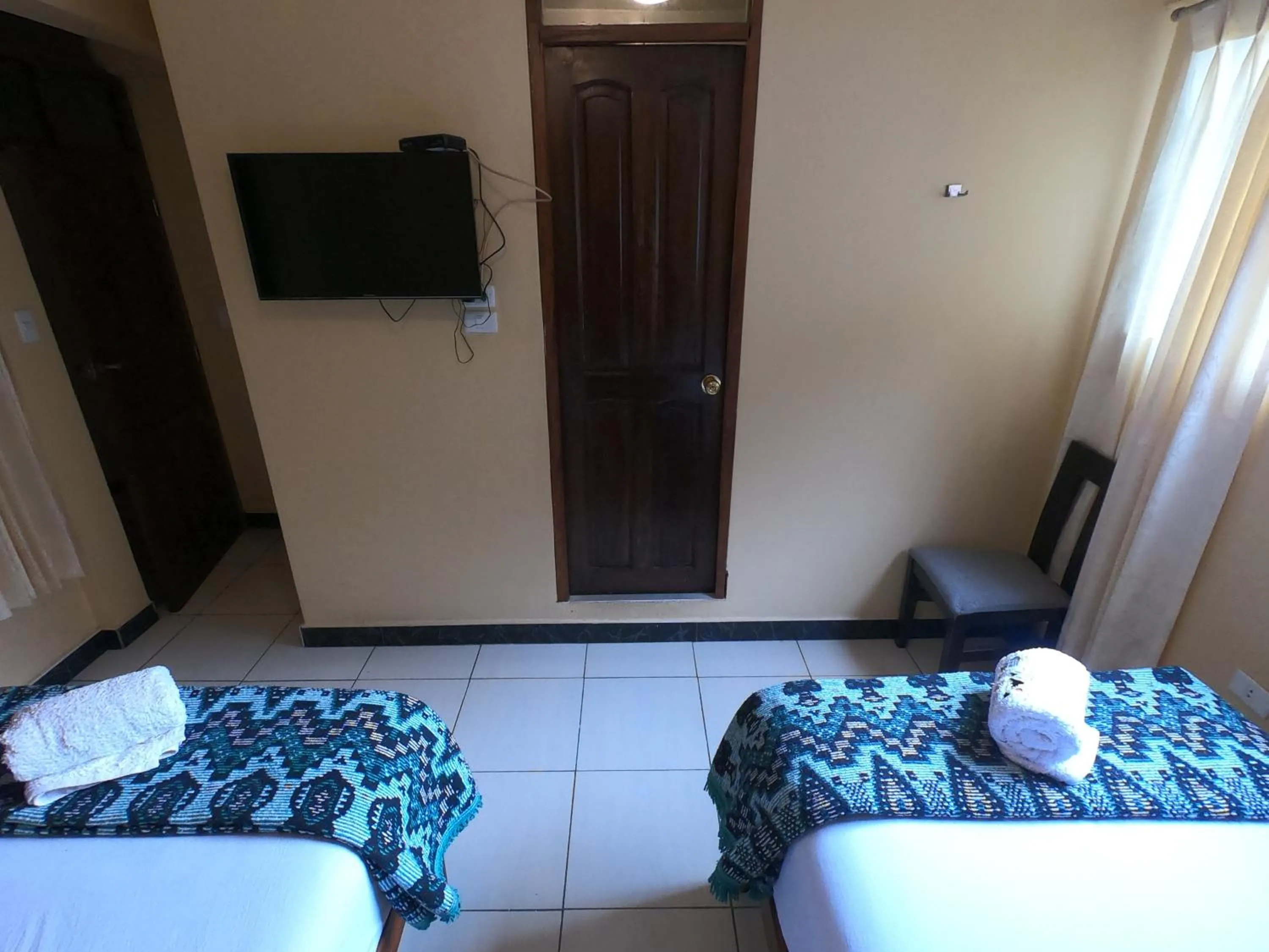 Communal lounge/ TV room in Don Feli House