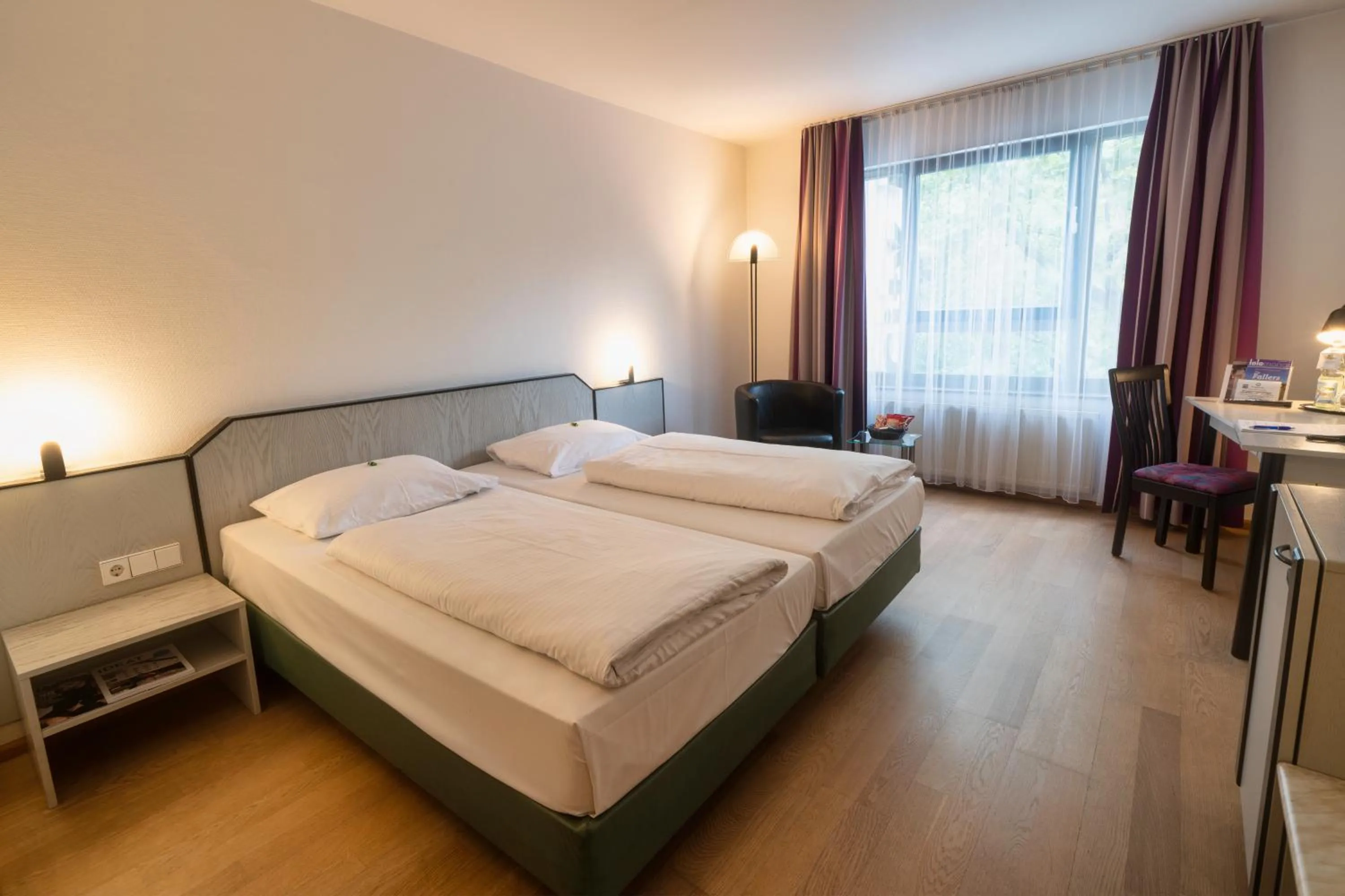 Photo of the whole room, Bed in City Hotel Fortuna Reutlingen