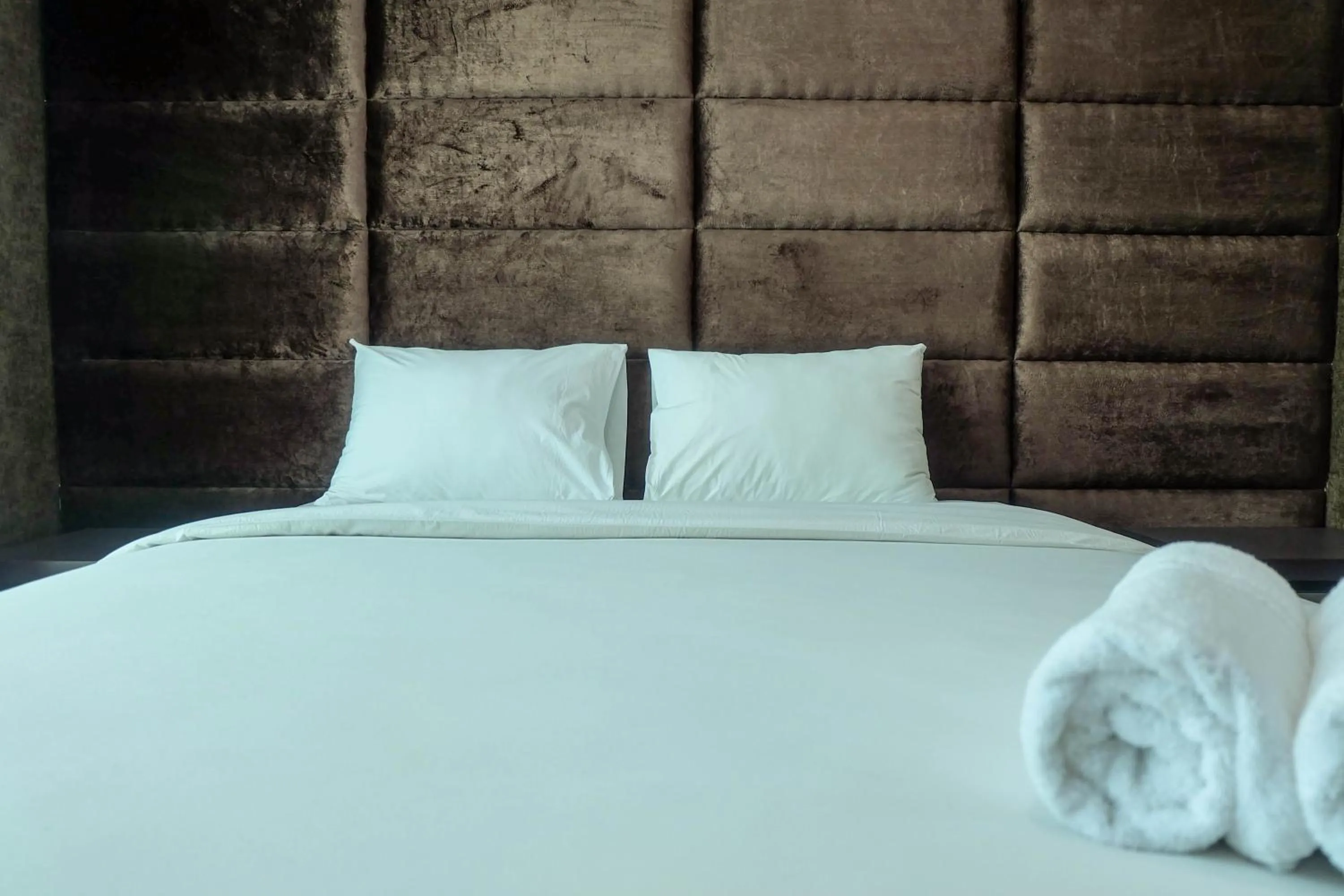 Bed in Good Location with Simply Furnished 1BR Apartment Woodland Park Residence By Travelio