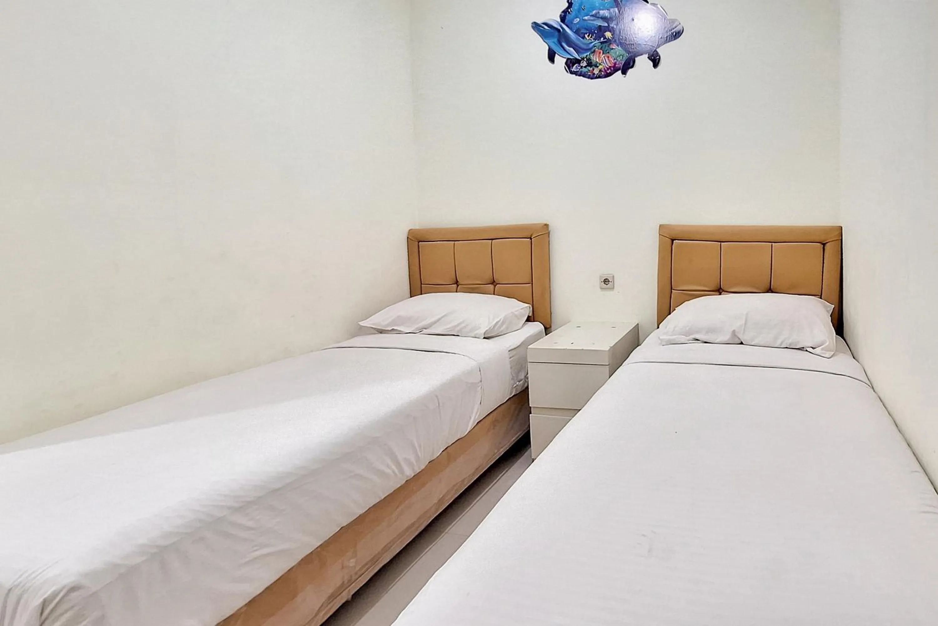 Bed in Papa Kana Farm Mitra RedDoorz At Pacet Mojokerto