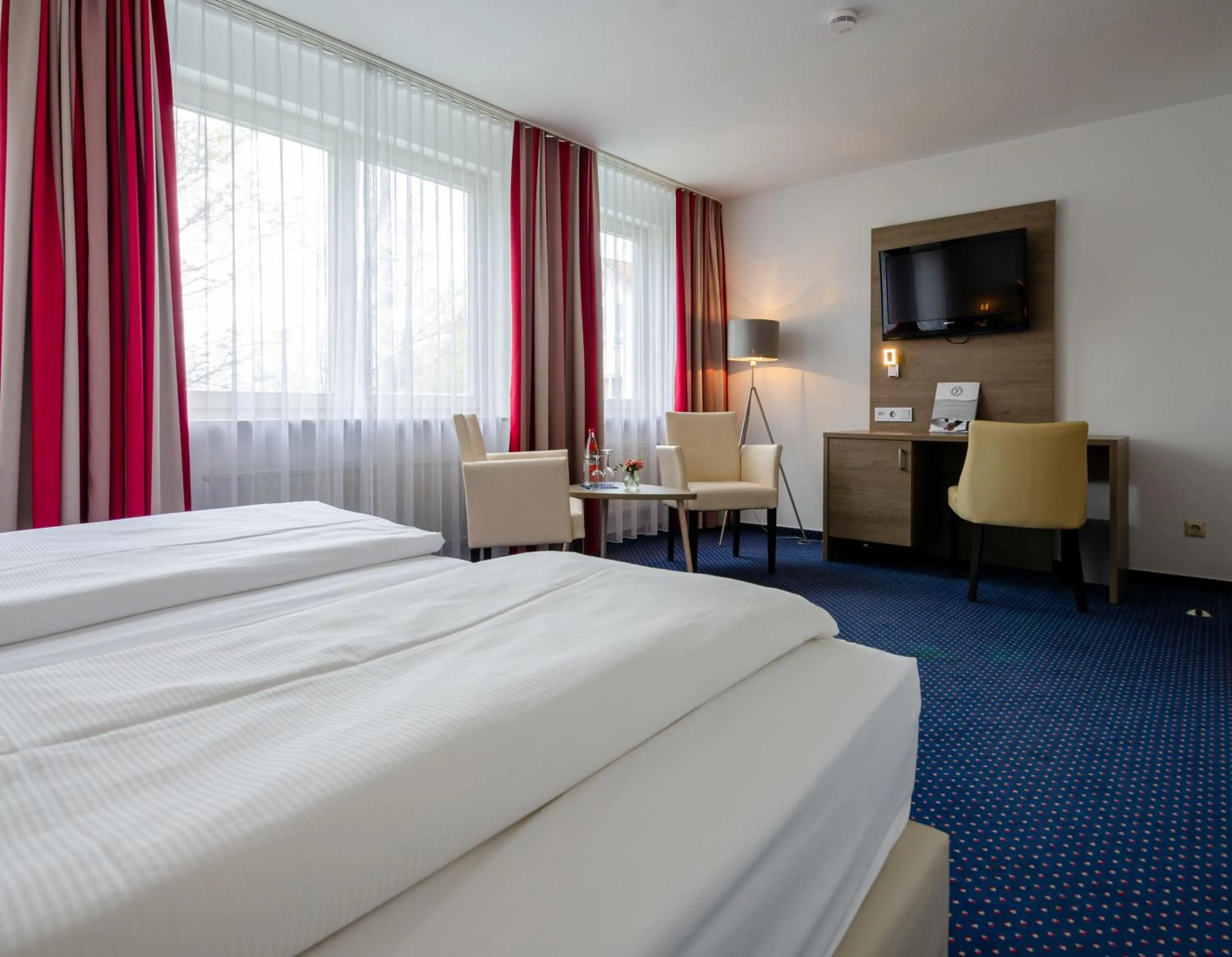 Photo of the whole room, Bed in Albhotel Fortuna