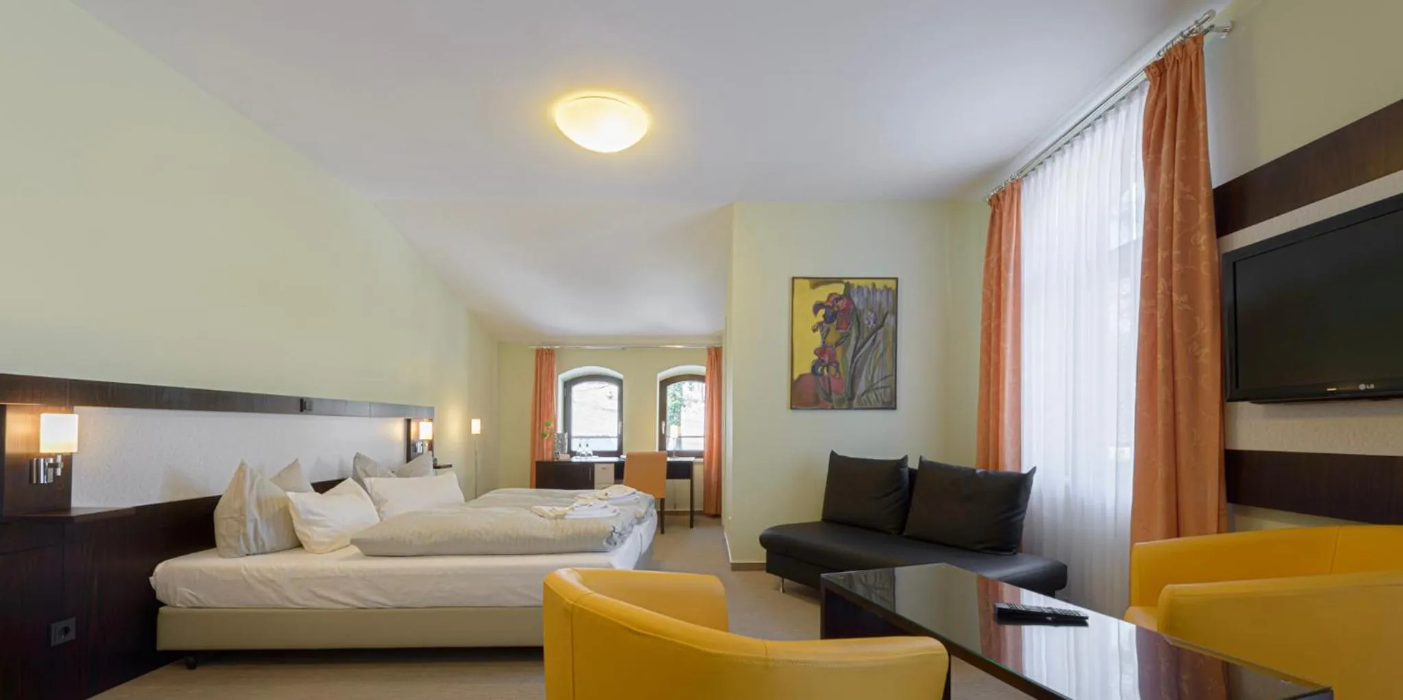 Photo of the whole room, Bed in Hotel Am Tiefwarensee