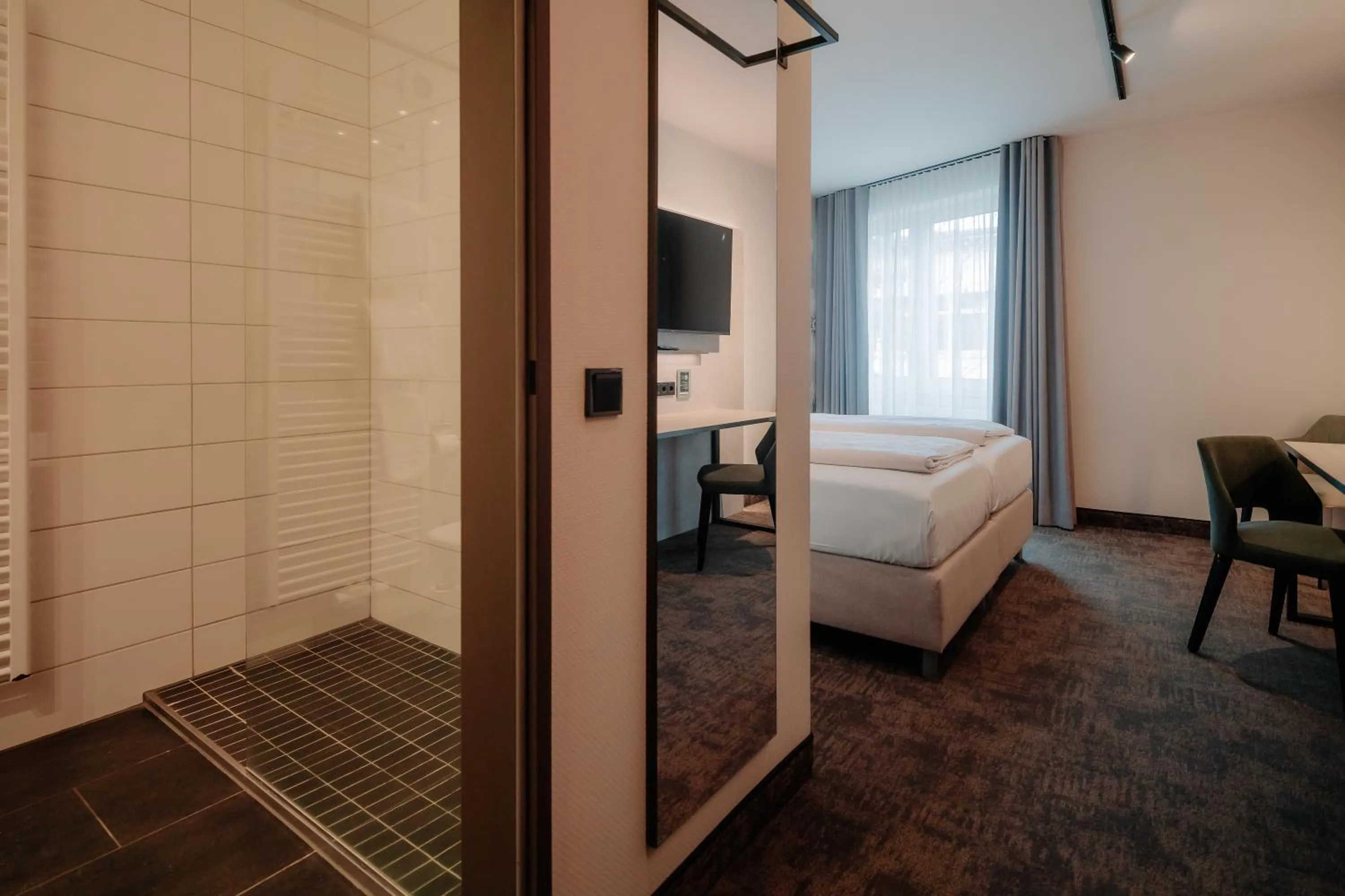 Photo of the whole room, Bed in Parkhotel Papenburg by Hackmann