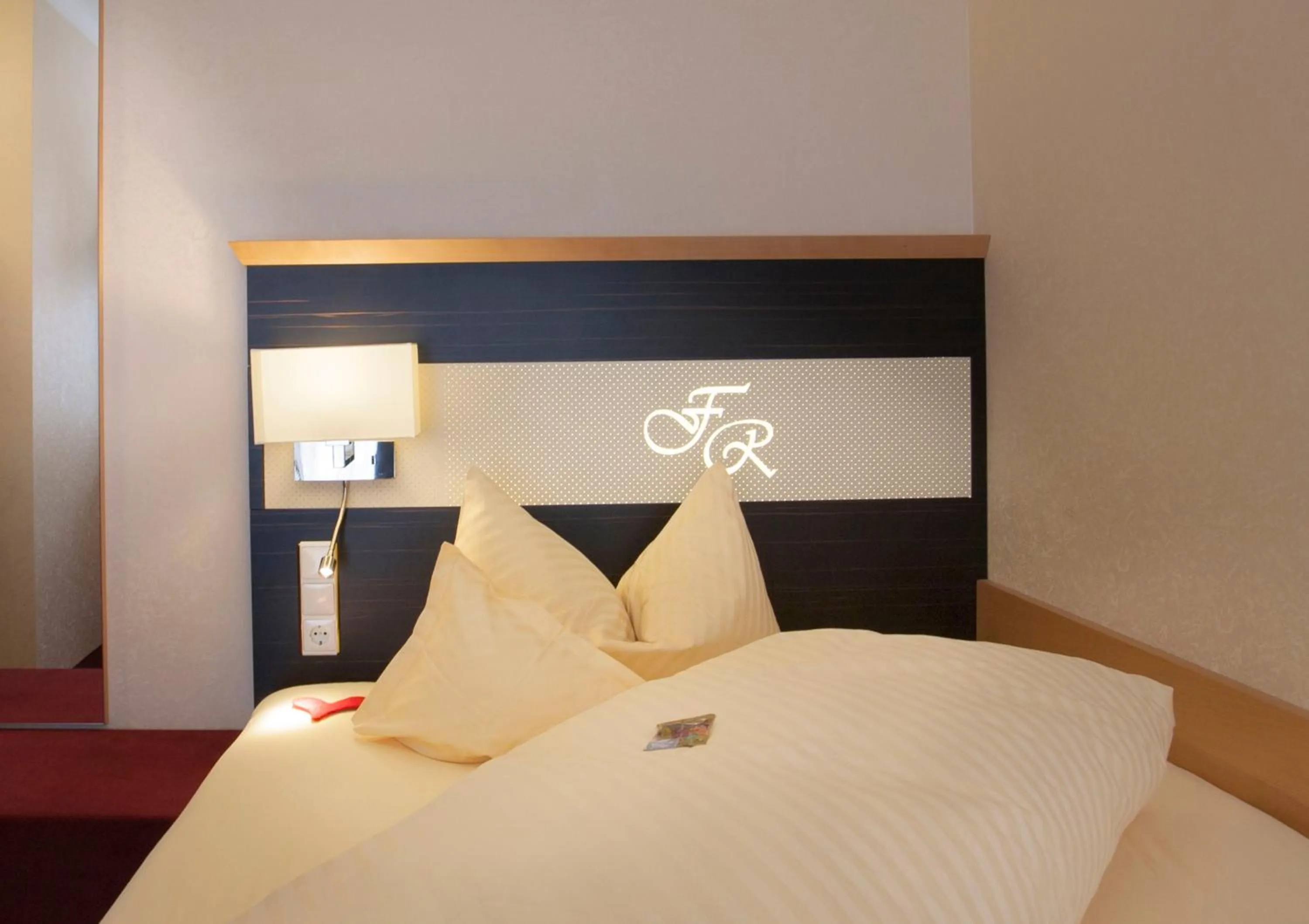 Photo of the whole room, Bed in Forellenhof Rössle Hotel & Restaurant