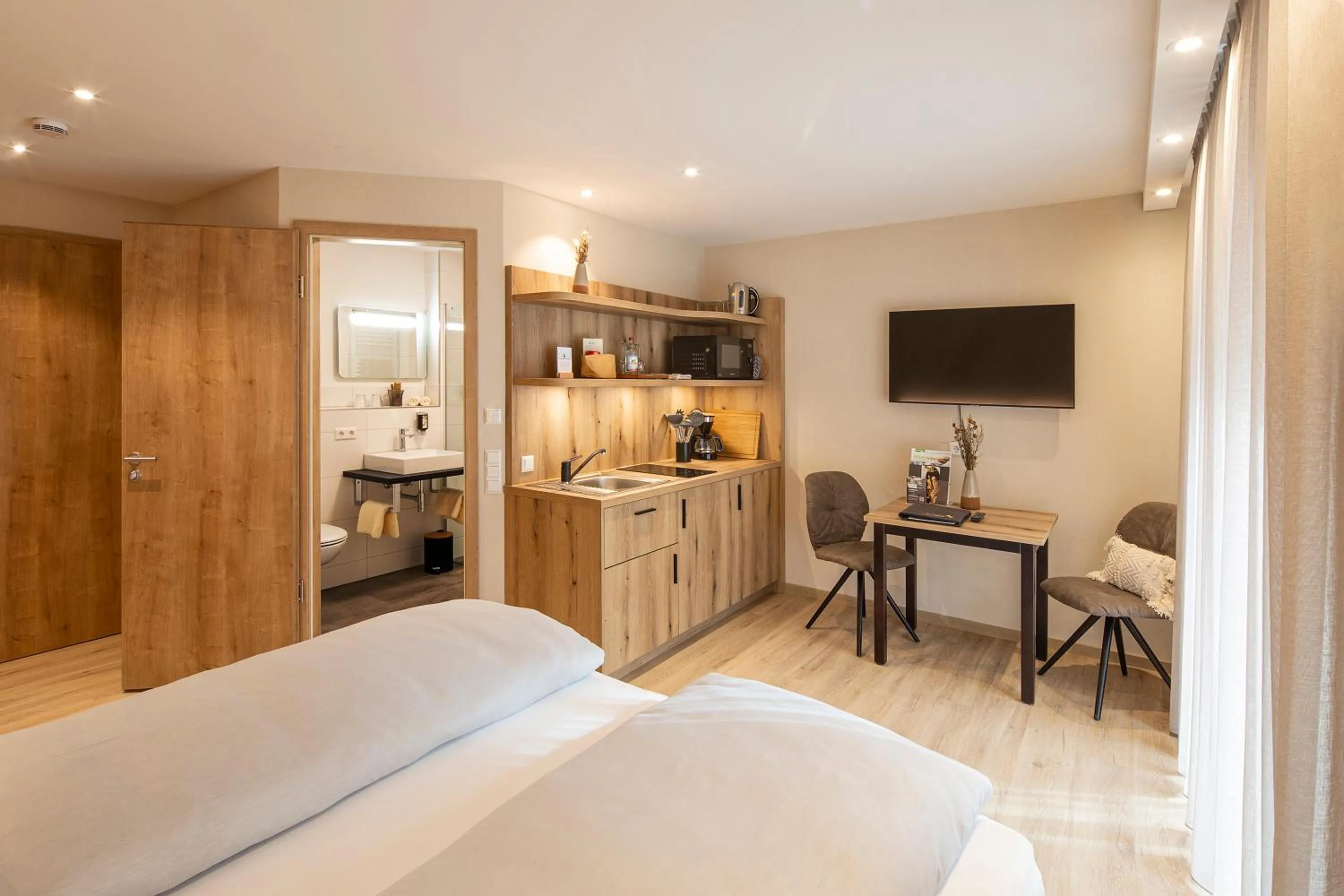 Photo of the whole room, Bed in Forellenhof Rössle Hotel & Restaurant