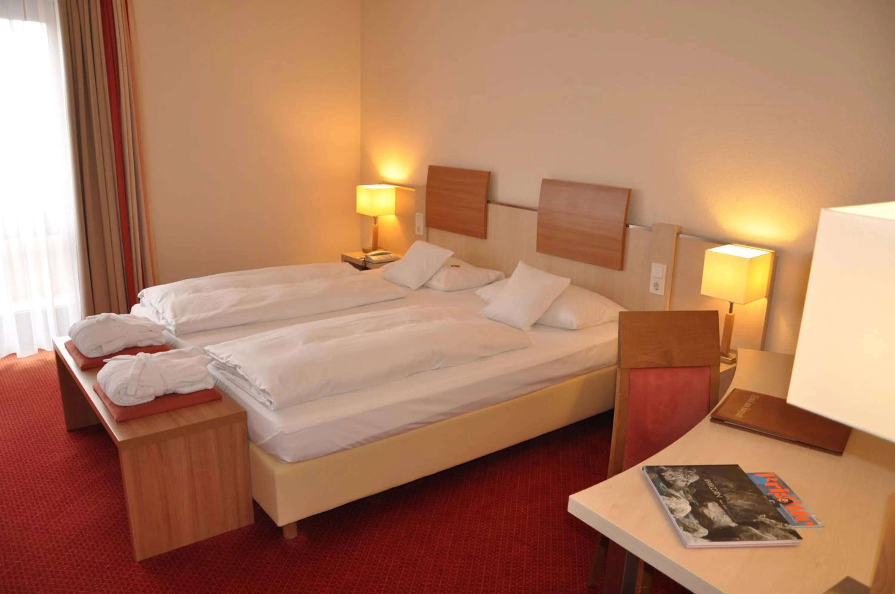 Photo of the whole room, Bed in Hotel am Kurpark