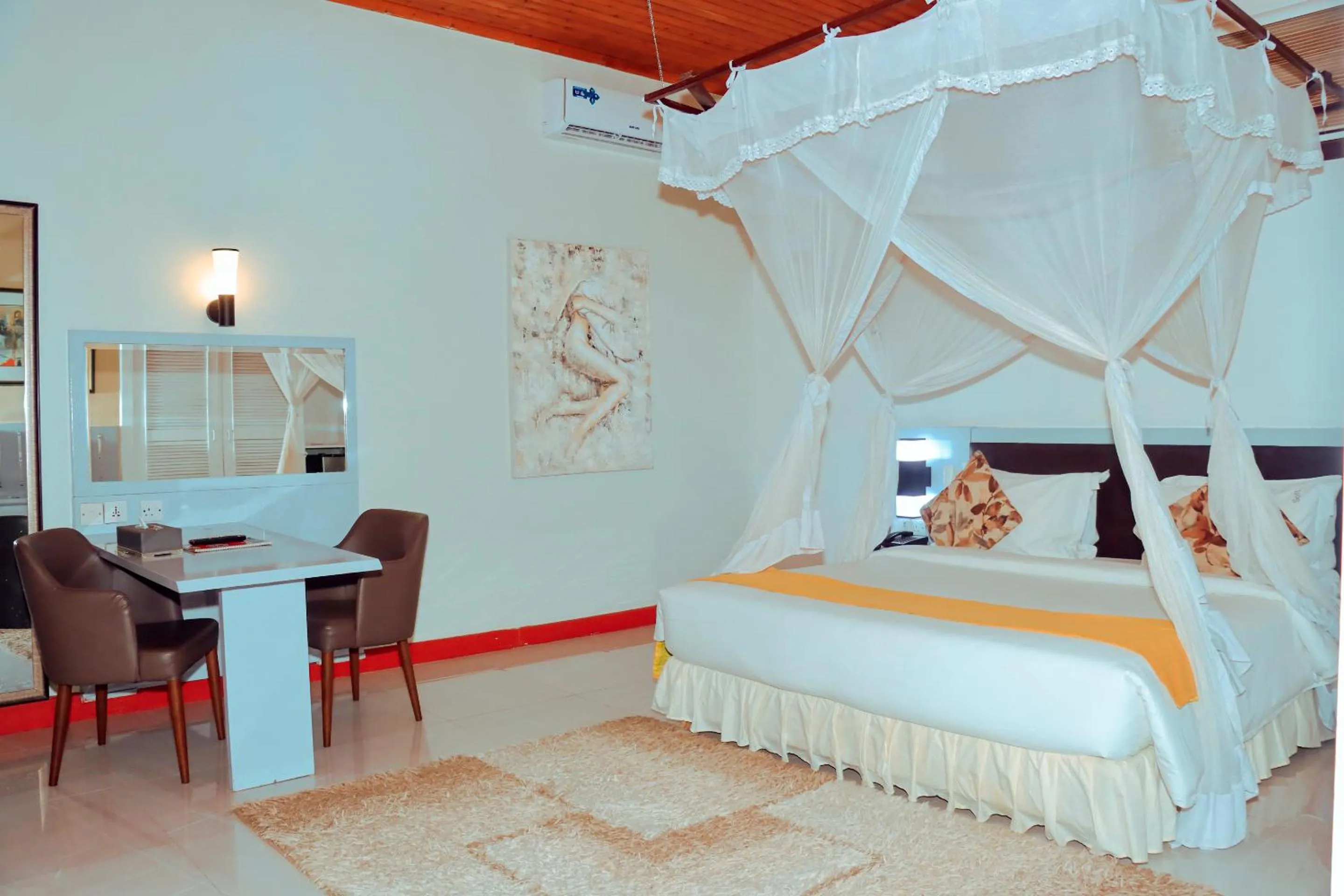 Bed in Best Western Jangwani Sea Breeze Resort