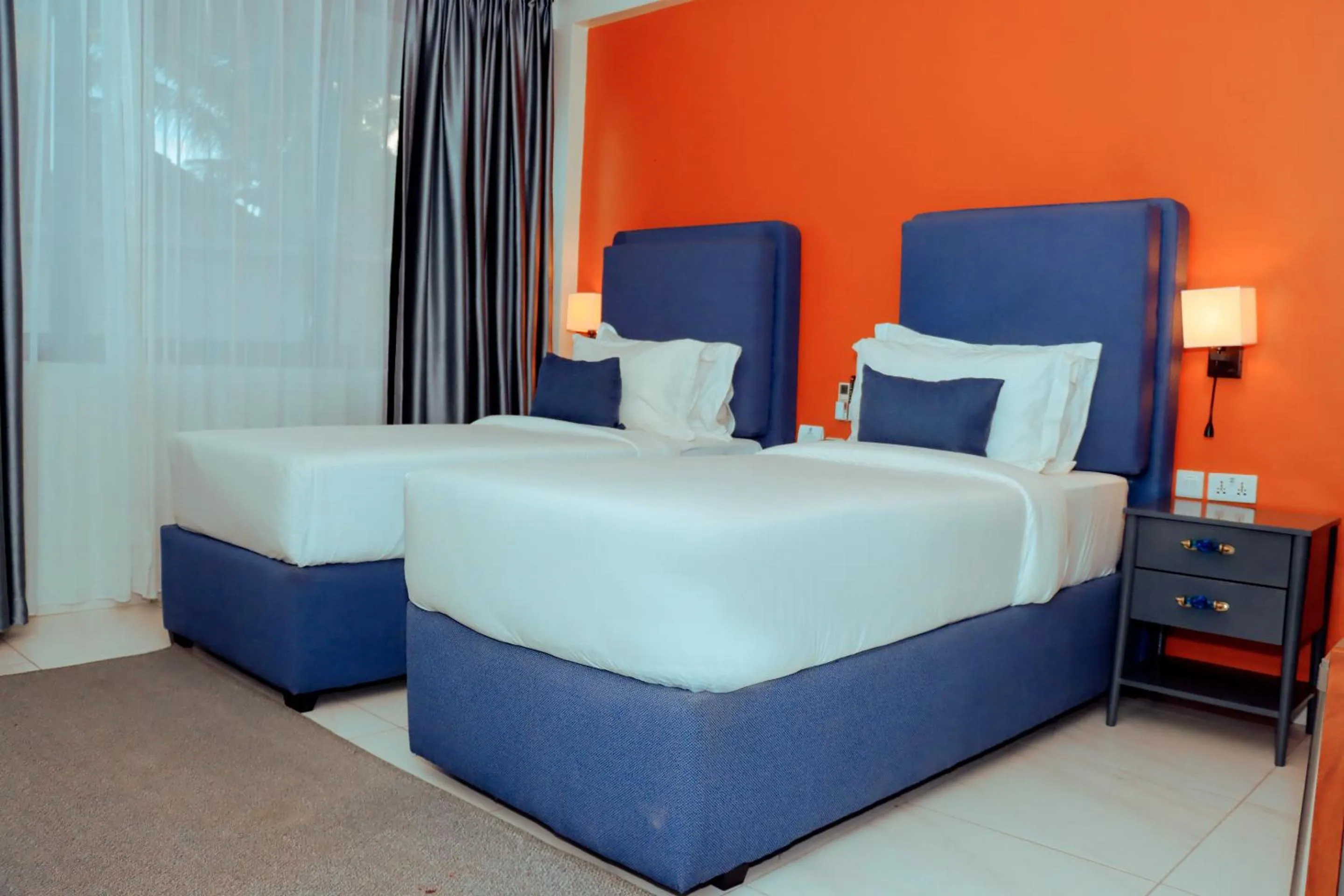 Bed in Best Western Jangwani Sea Breeze Resort
