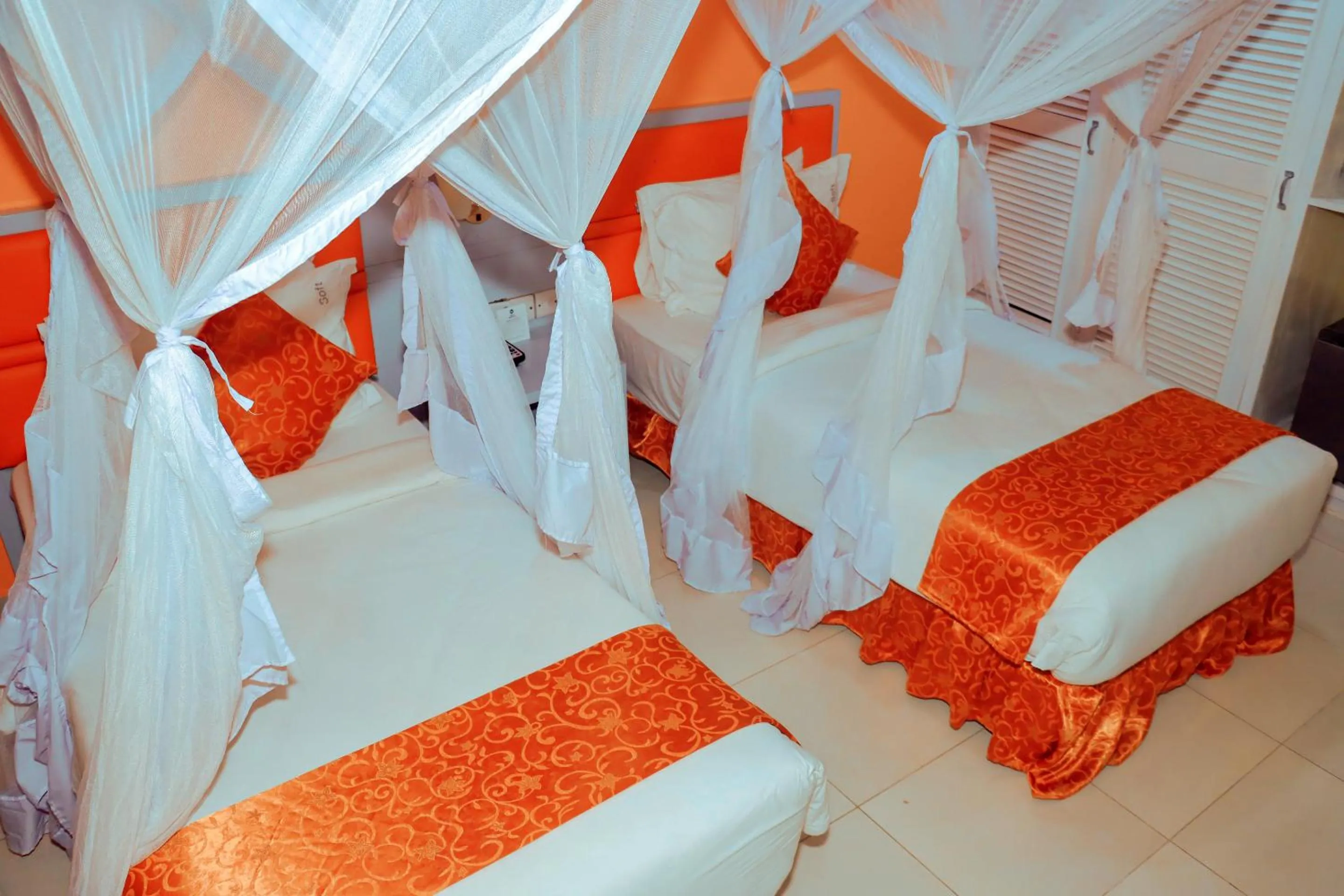 Bed in Best Western Jangwani Sea Breeze Resort