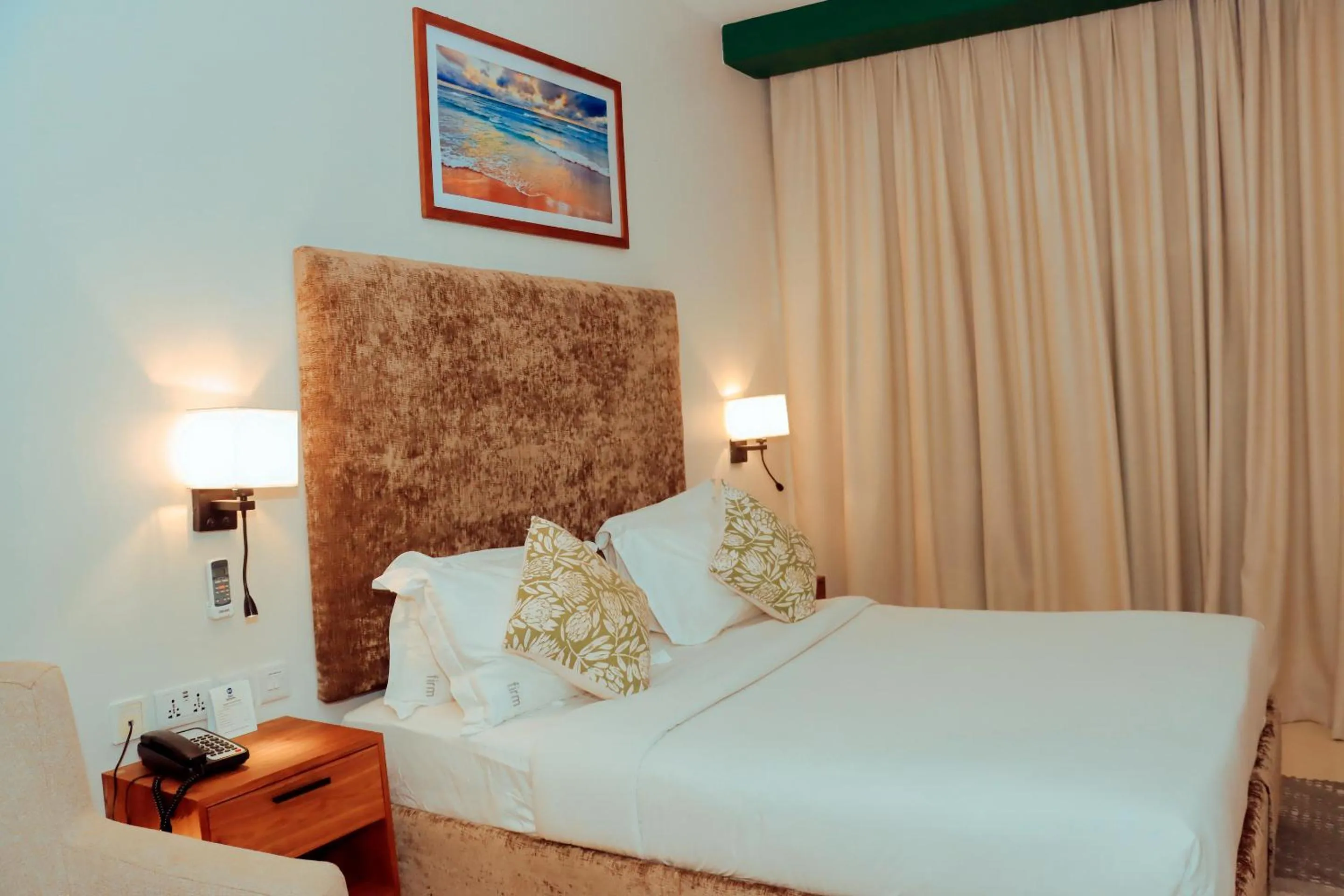 Bed in Best Western Jangwani Sea Breeze Resort