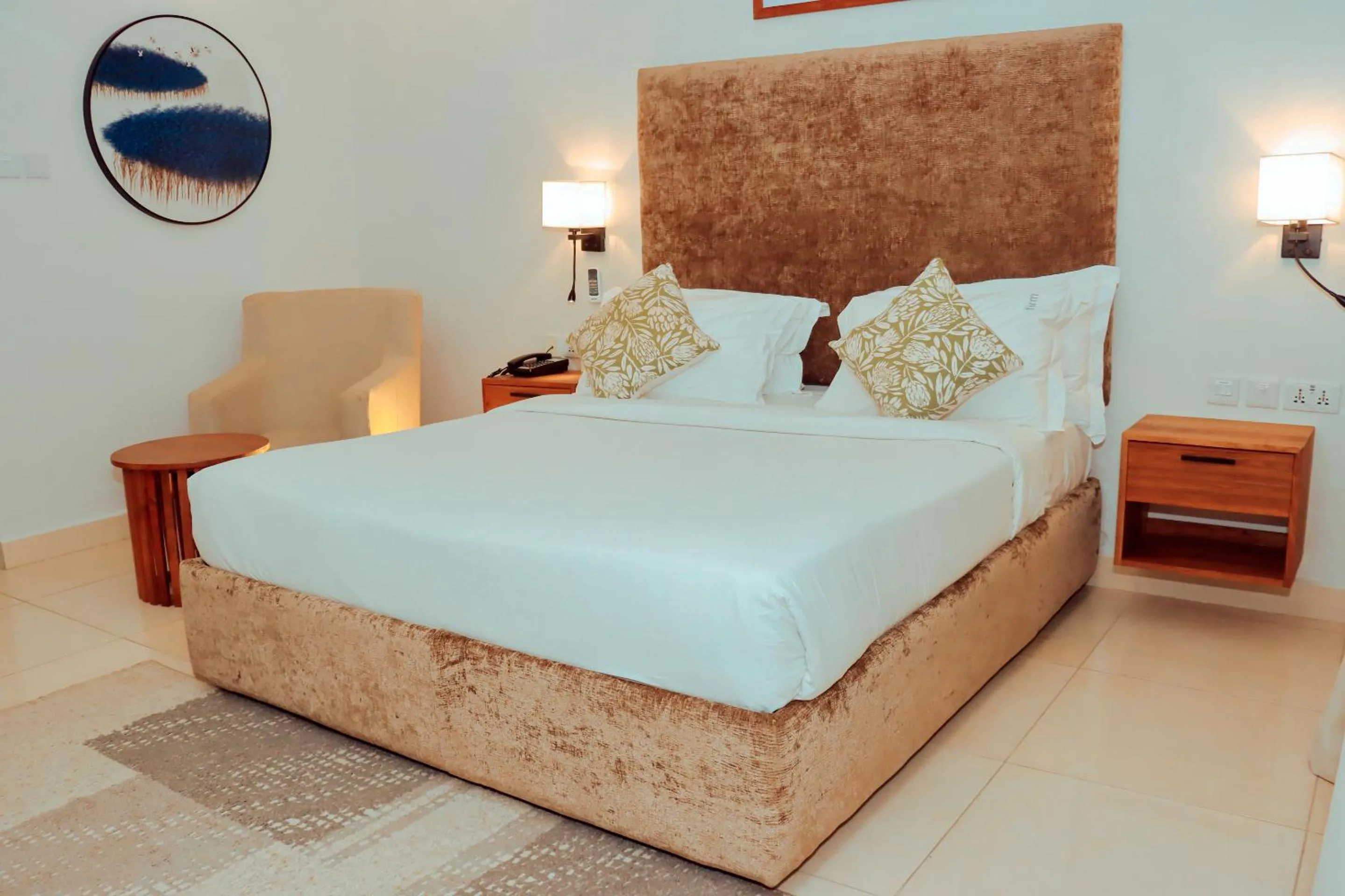 Bed in Best Western Jangwani Sea Breeze Resort