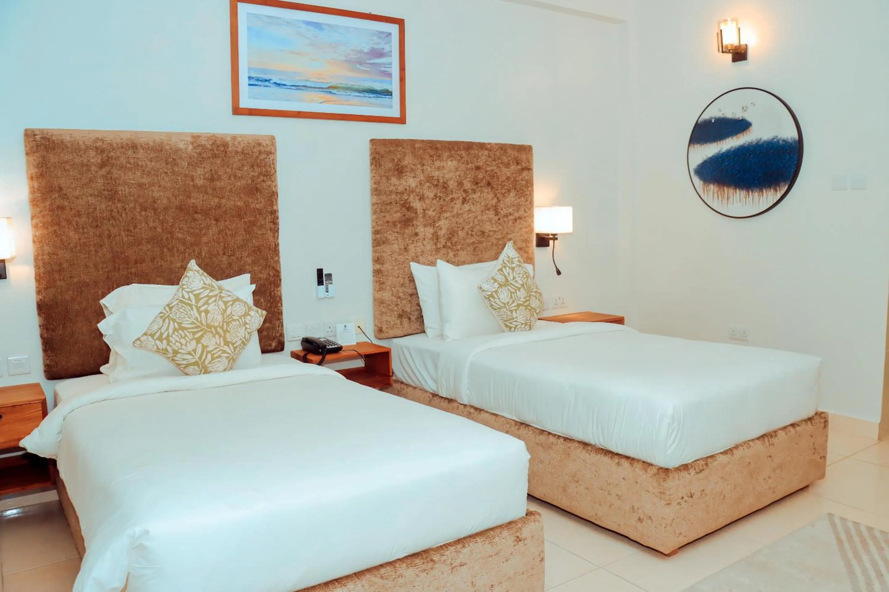 Bed in Best Western Jangwani Sea Breeze Resort