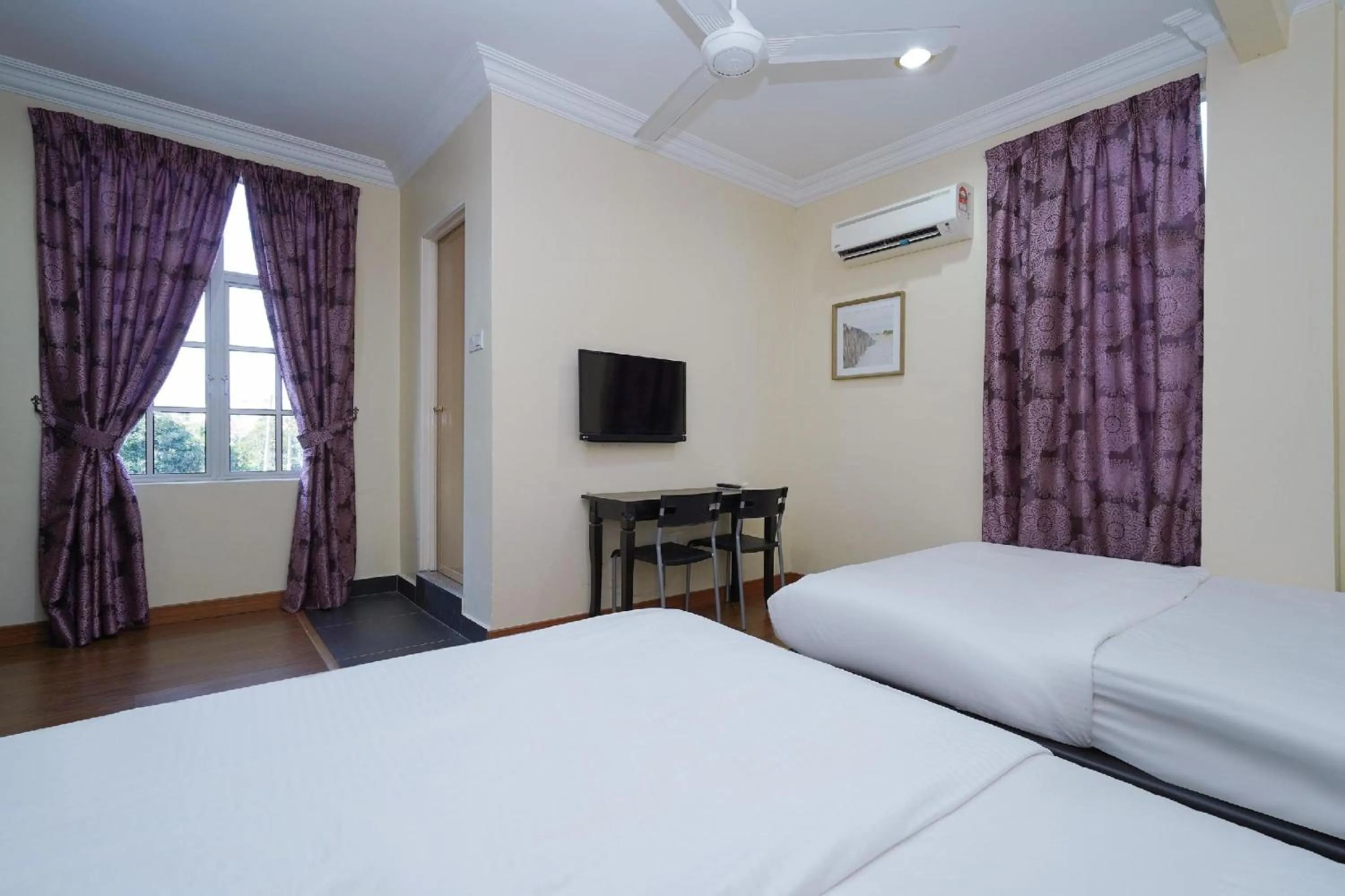 Photo of the whole room, Bed in Hotel O Bangi Sri Minang Guesthouse