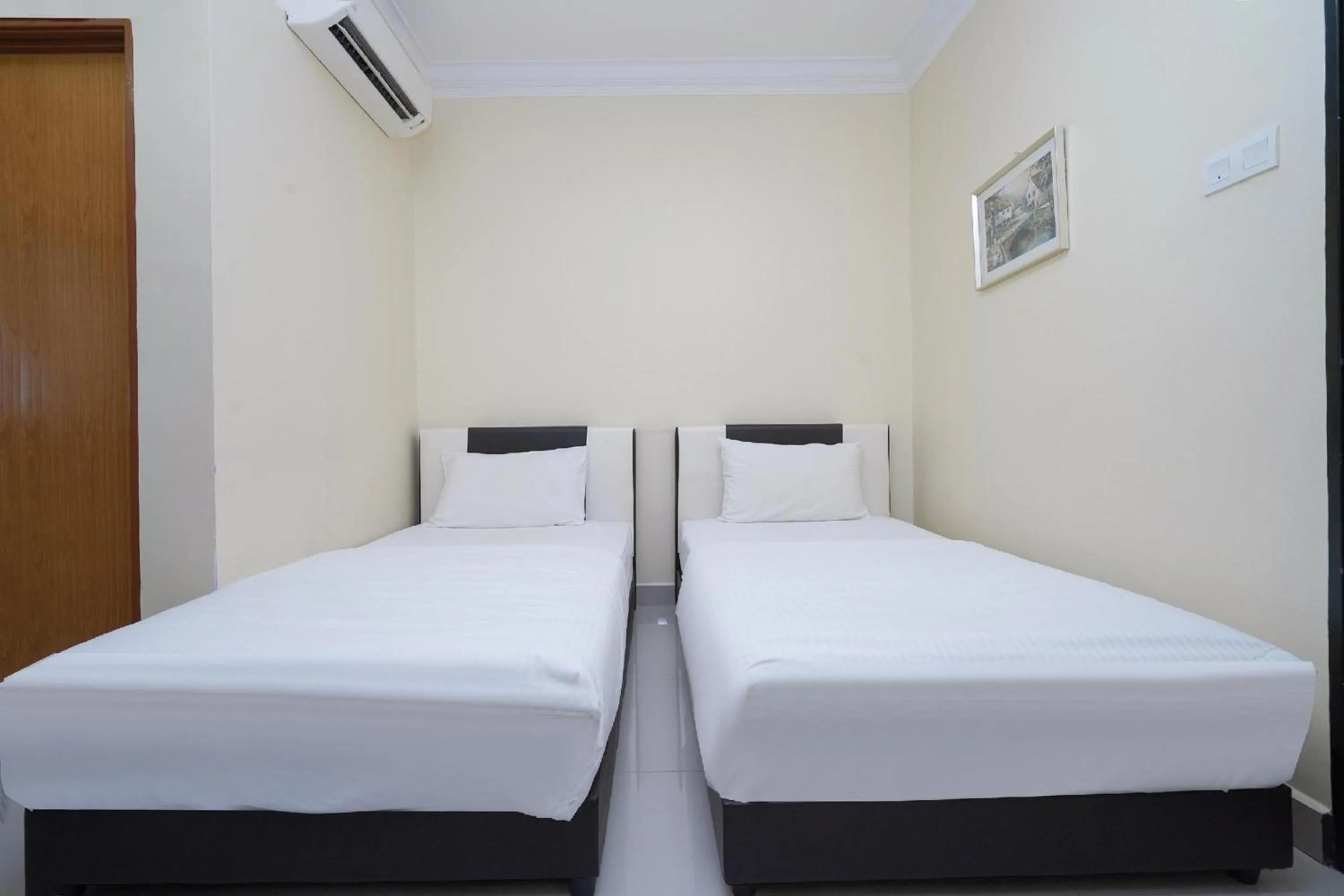 Photo of the whole room, Bed in Hotel O Bangi Sri Minang Guesthouse