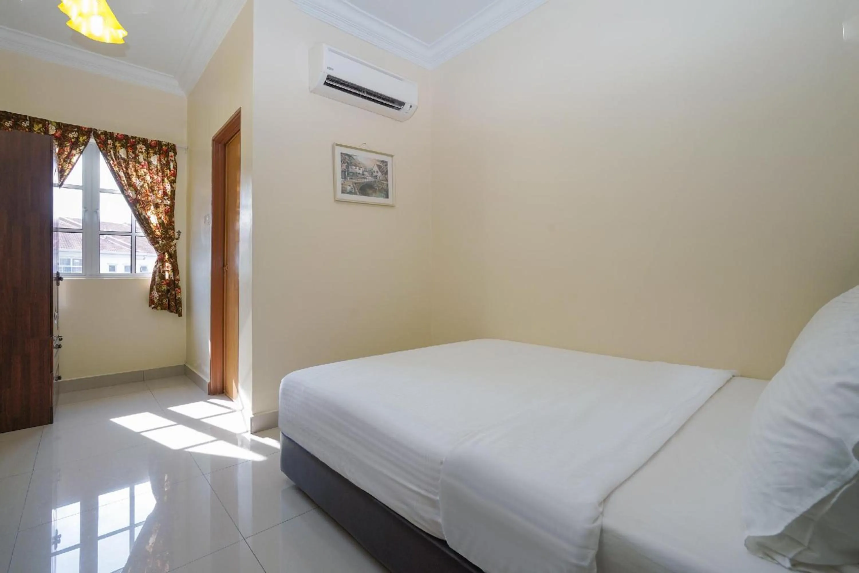 Photo of the whole room, Bed in Hotel O Bangi Sri Minang Guesthouse