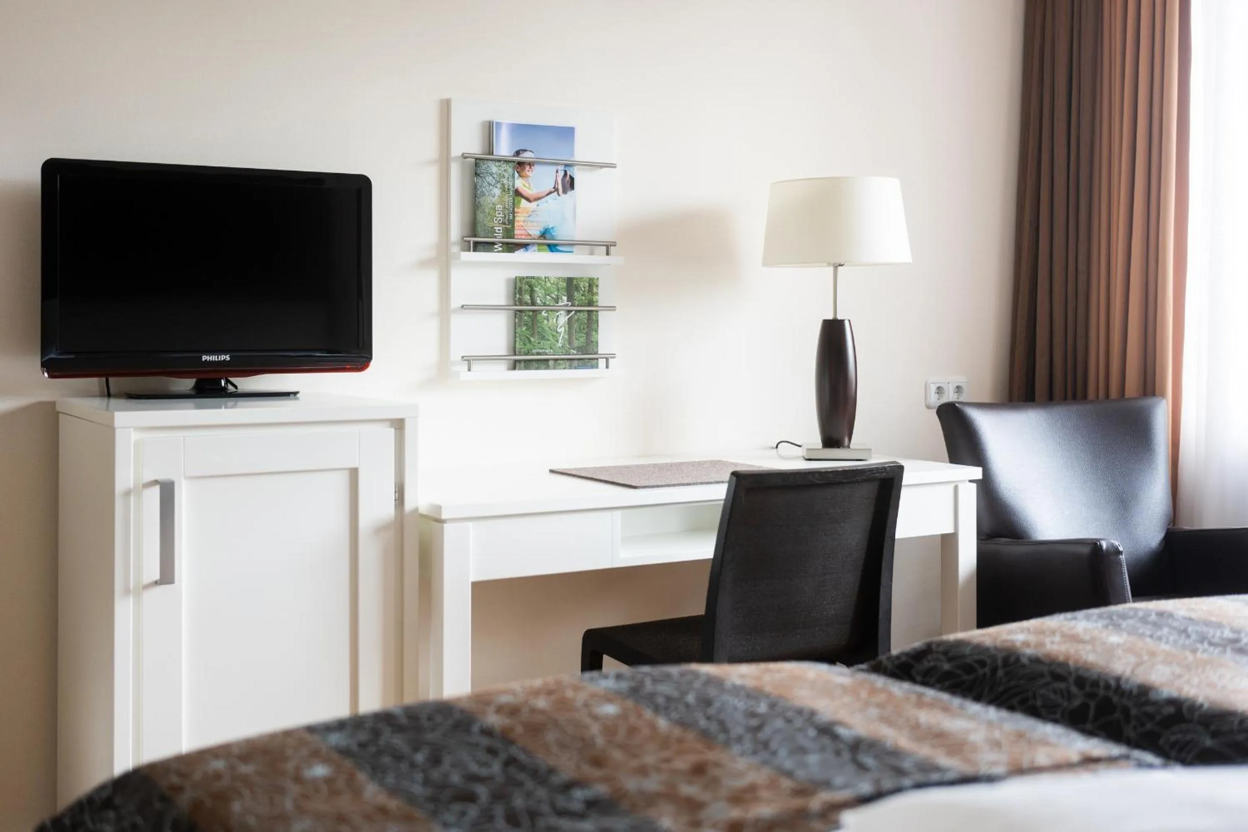 TV and multimedia, Bed in MUNTE - Wellnesshotel am Stadtwald
