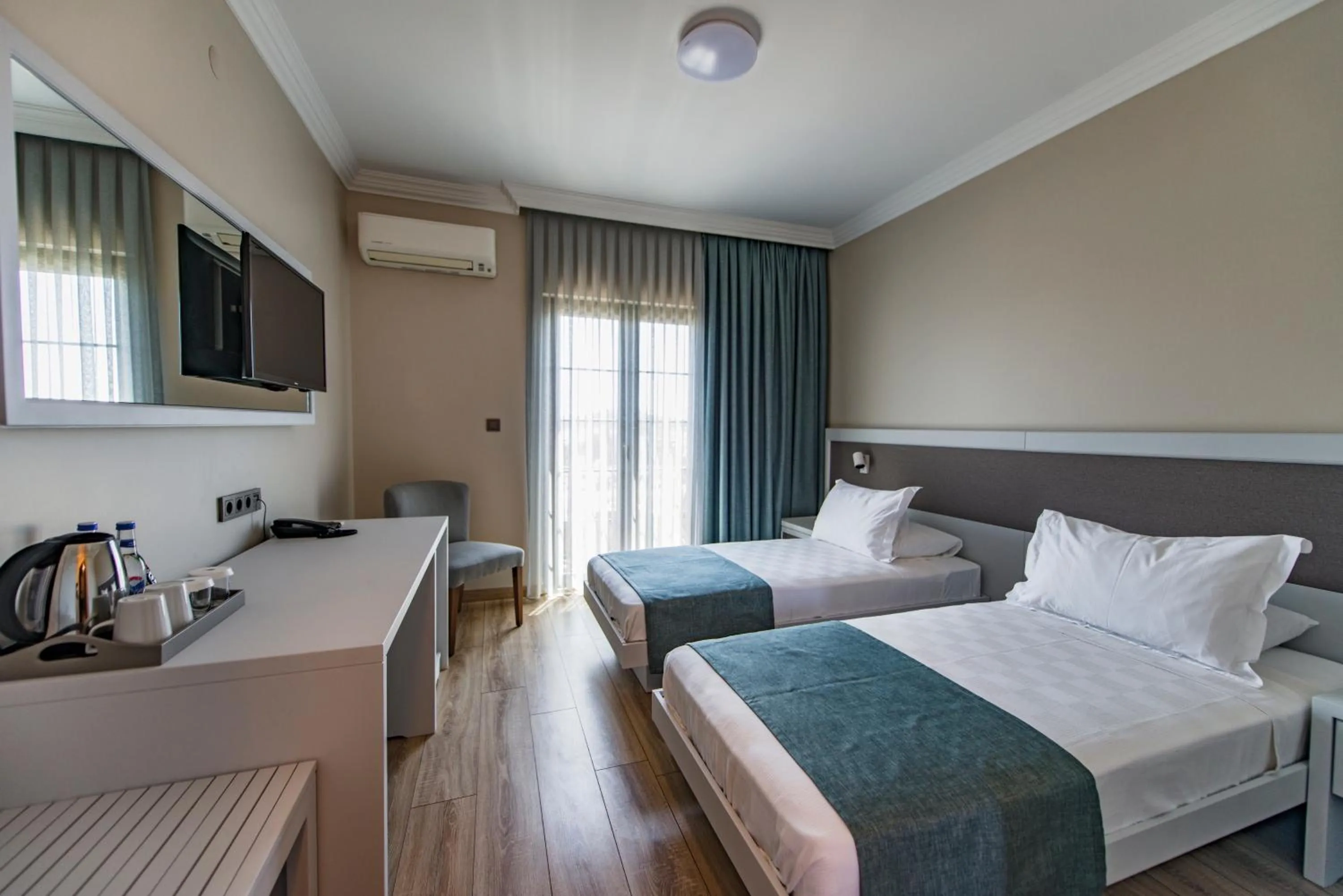 Bed in Elia Hotel Cunda by Ortunc