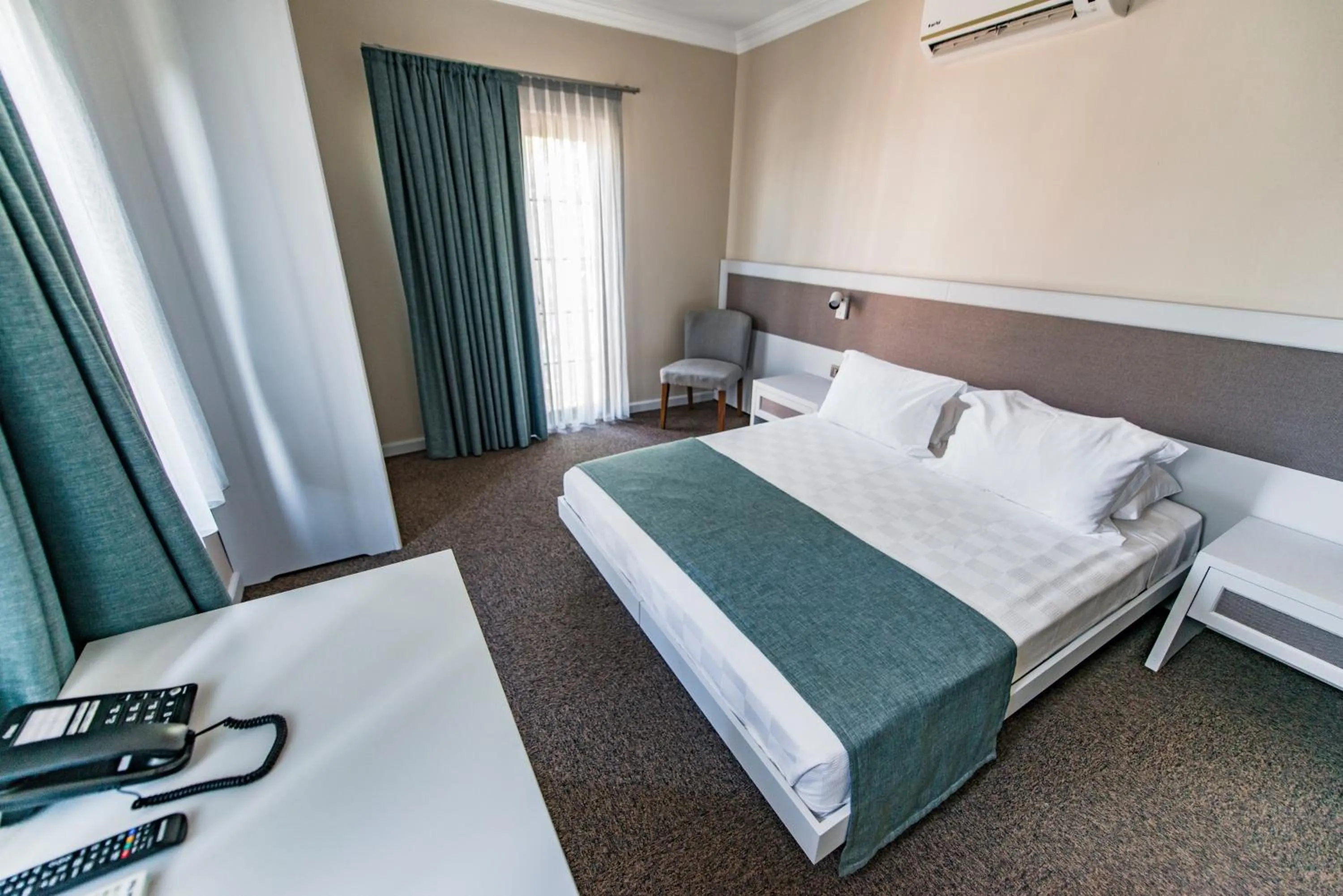 Bed in Elia Hotel Cunda by Ortunc