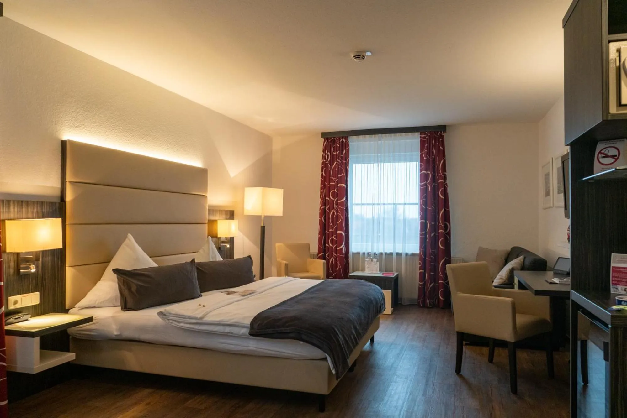 Photo of the whole room, Bed in Hotel Stadt Cuxhaven