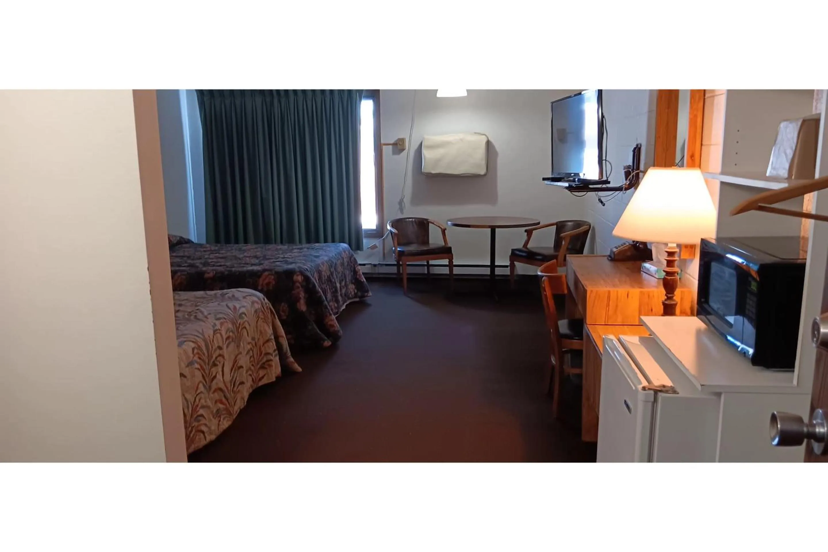 Bedroom in Scotwood Motel by OYO Washburn ND