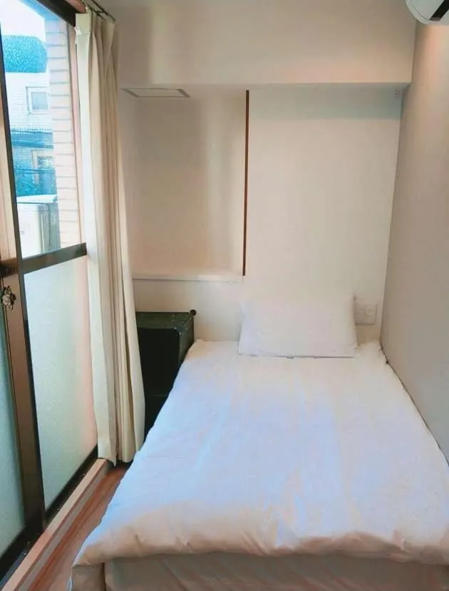 Bed in Tokyo shinjukutei Hotel Asahi gruop 東京新宿亭ホテル