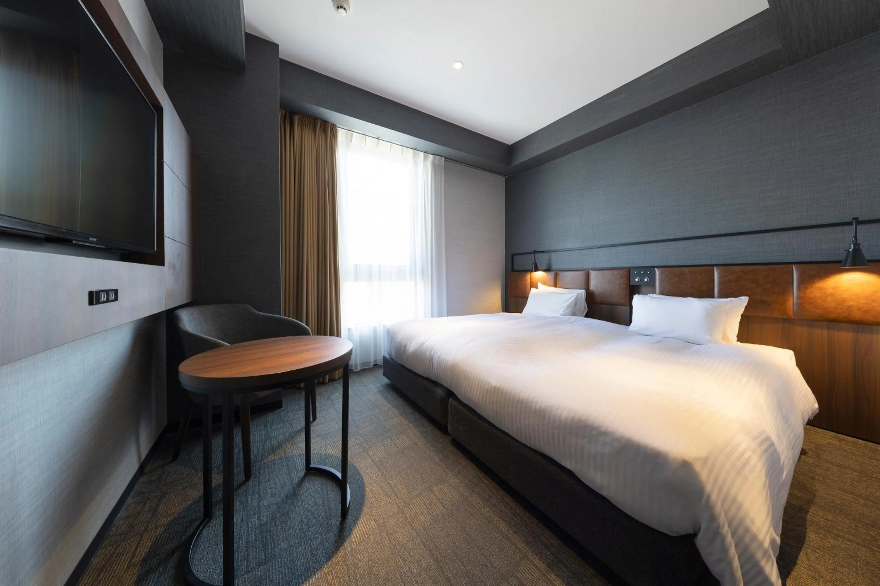 Bed in Joytel Hotel Osaka Shinsekai