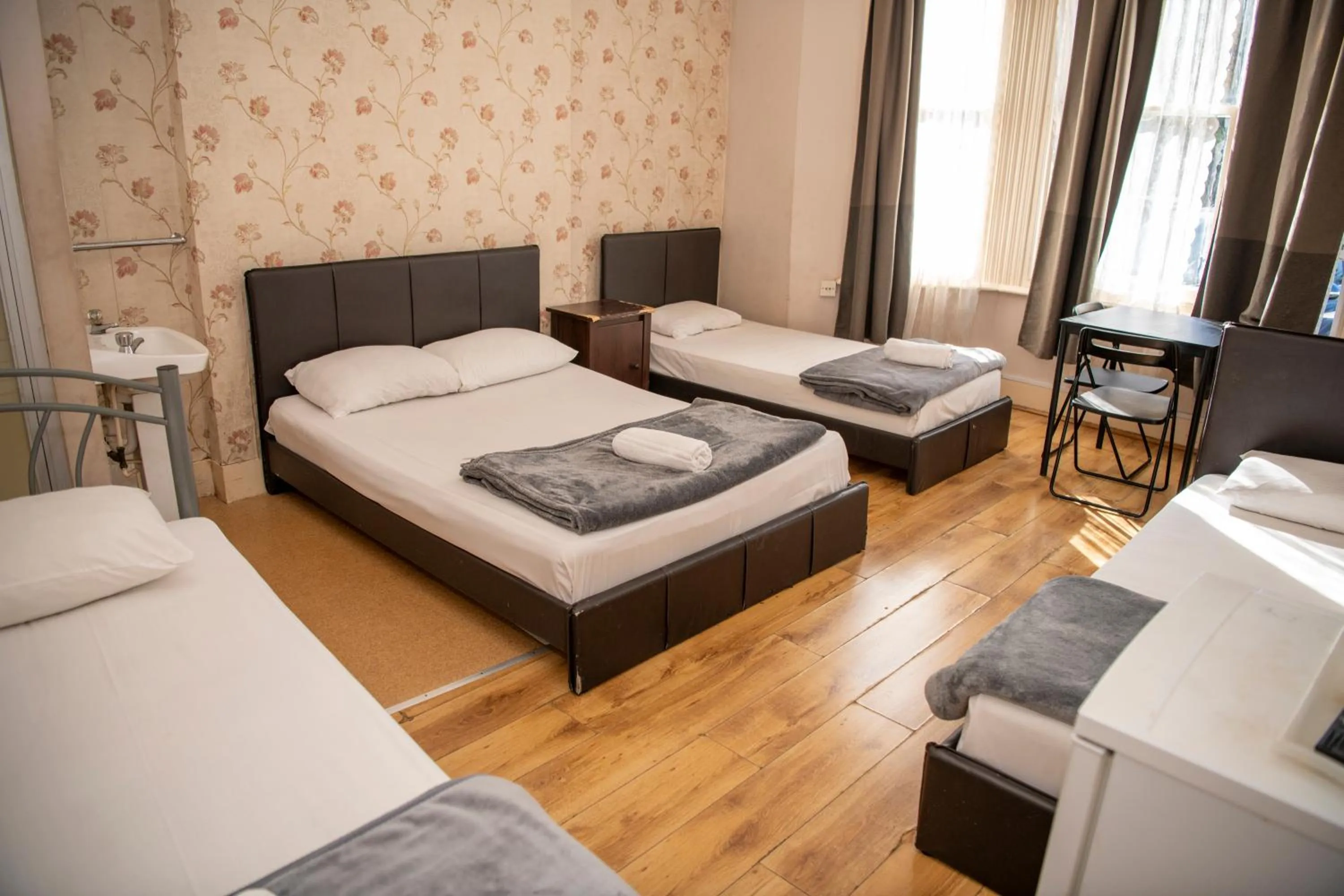 Bed in The Crystal Lodge Hotel