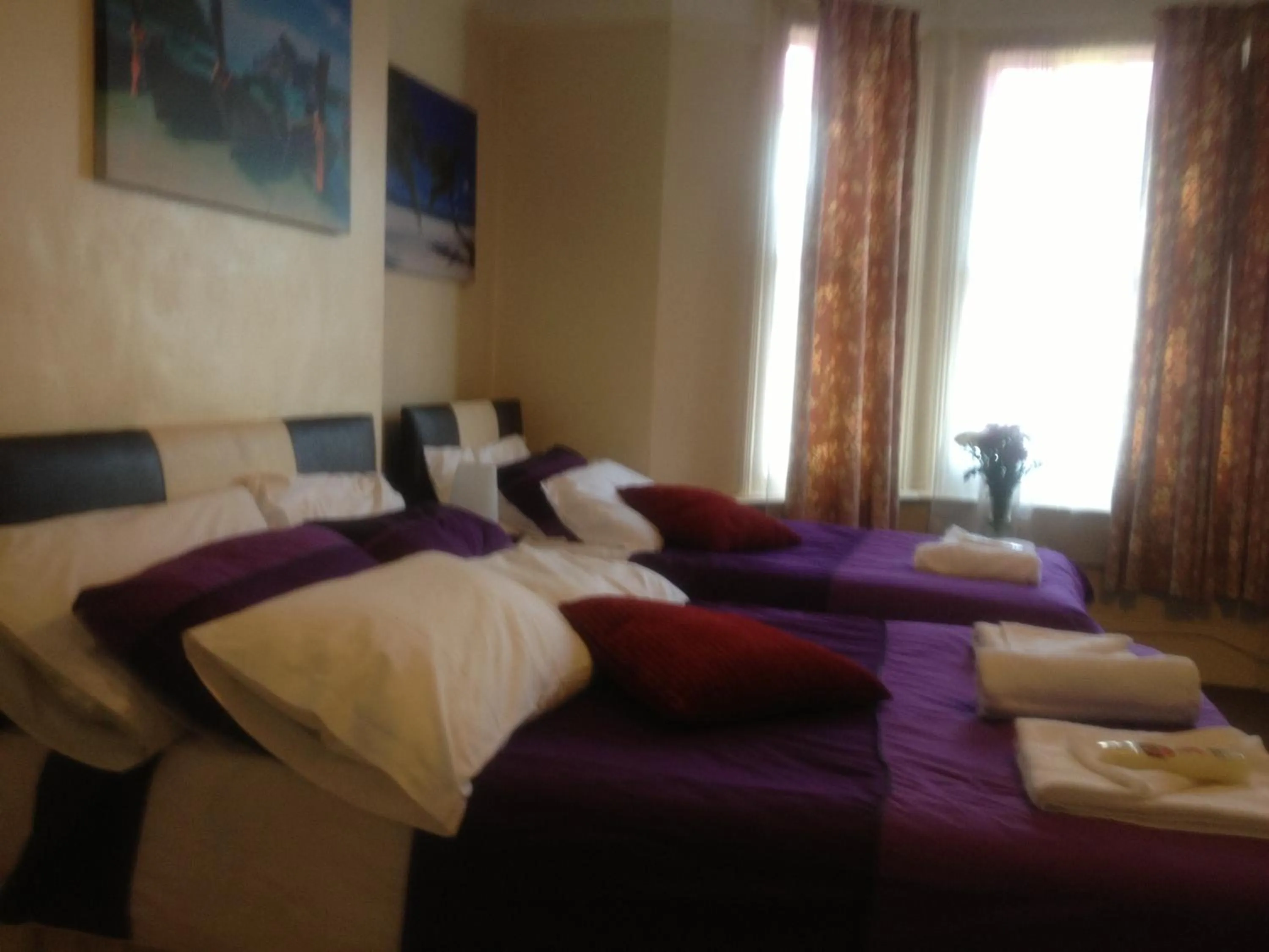 Bed in The Crystal Lodge Hotel