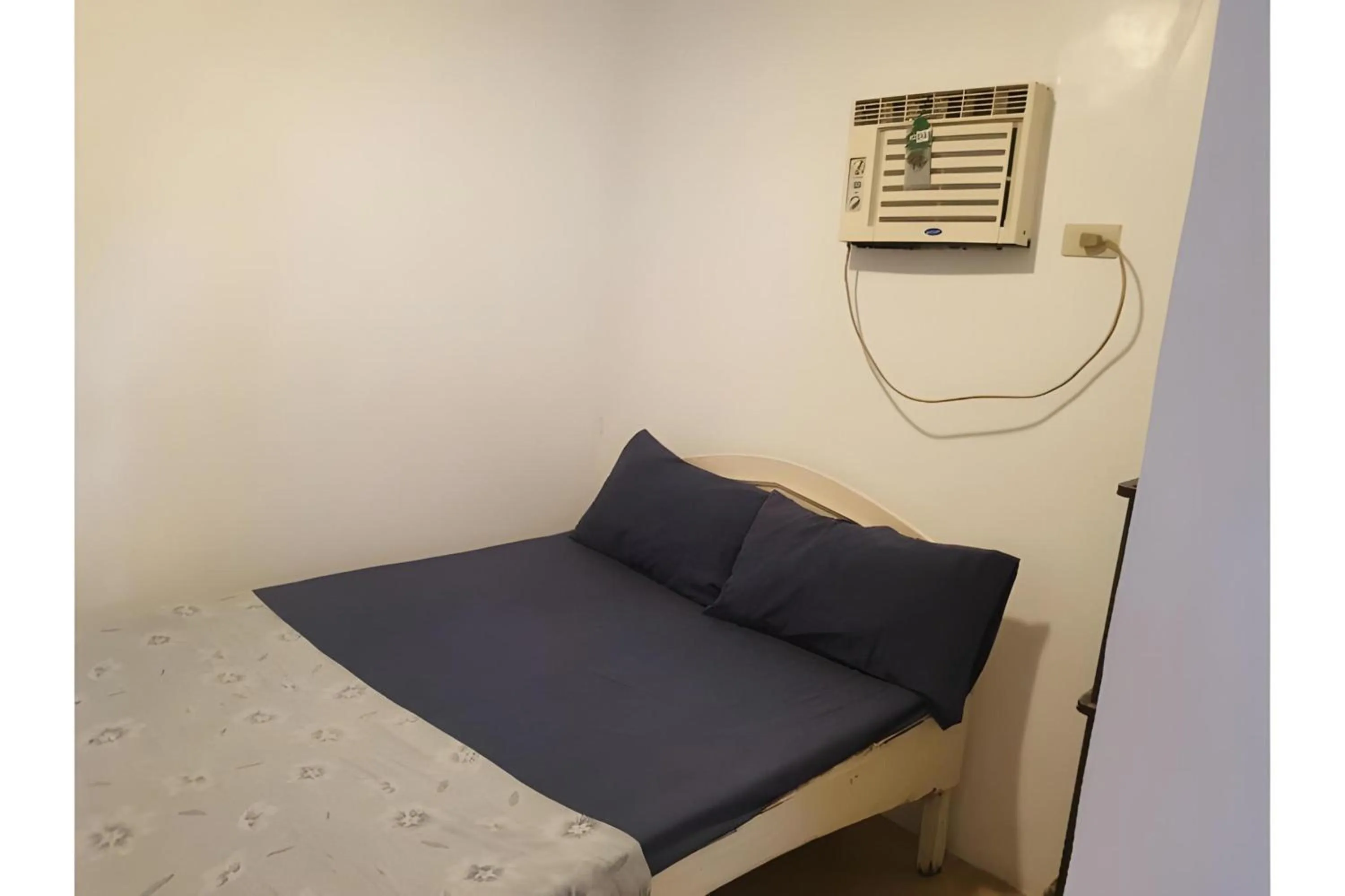 Photo of the whole room, Bed in OYO 588 Sunrock Resort