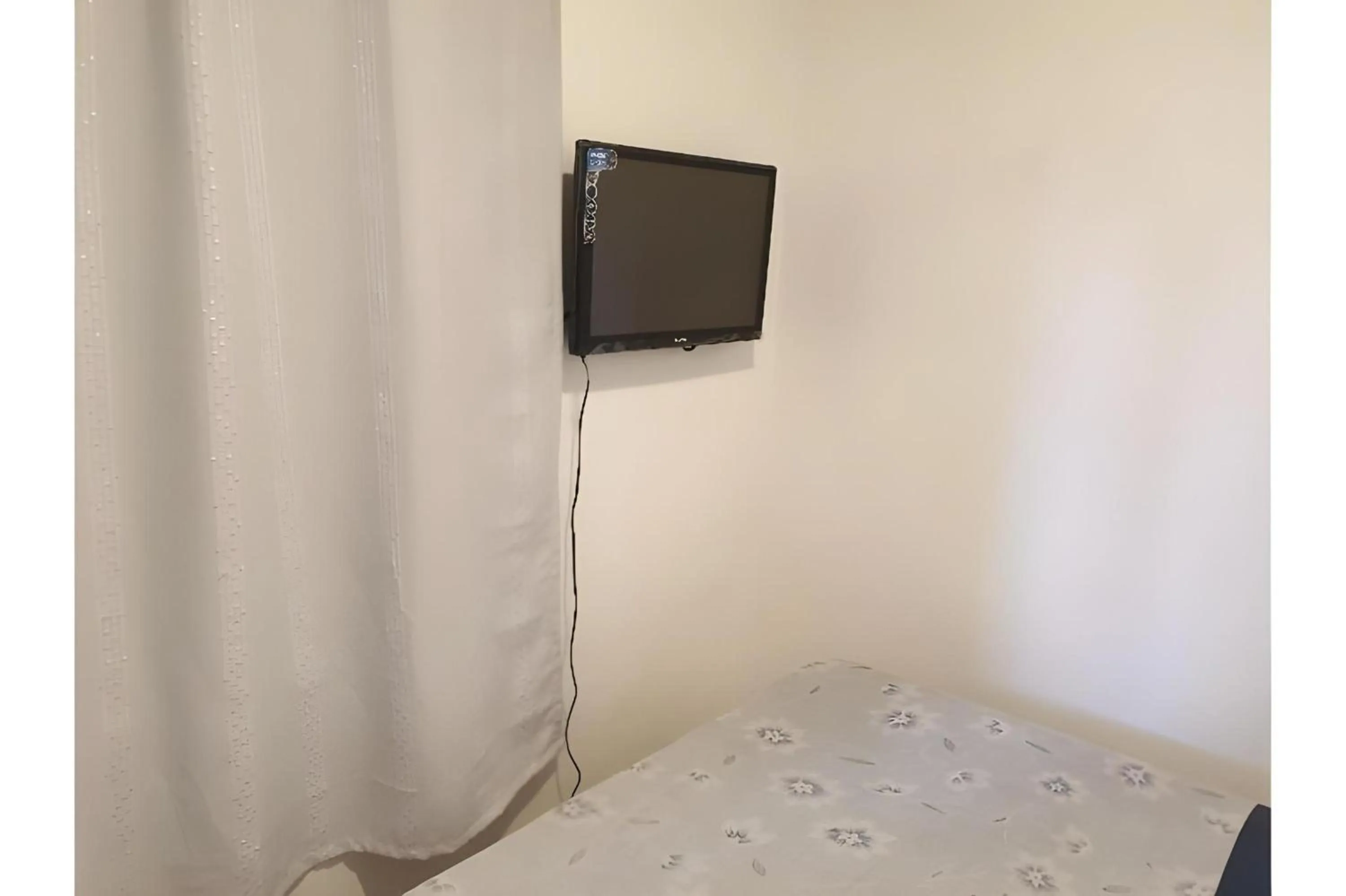 Photo of the whole room, Bed in OYO 588 Sunrock Resort