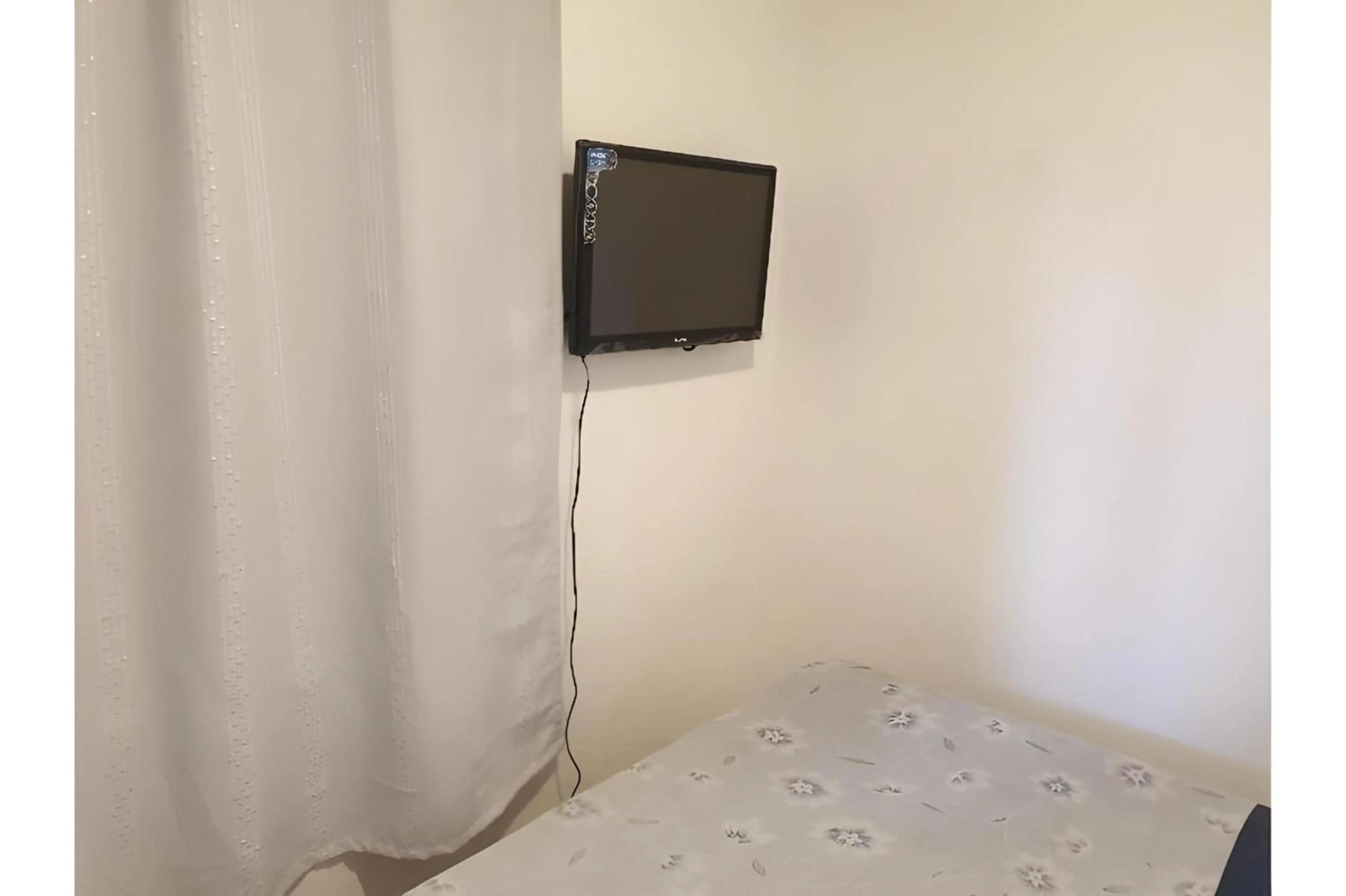 Photo of the whole room, Bed in OYO 588 Sunrock Resort