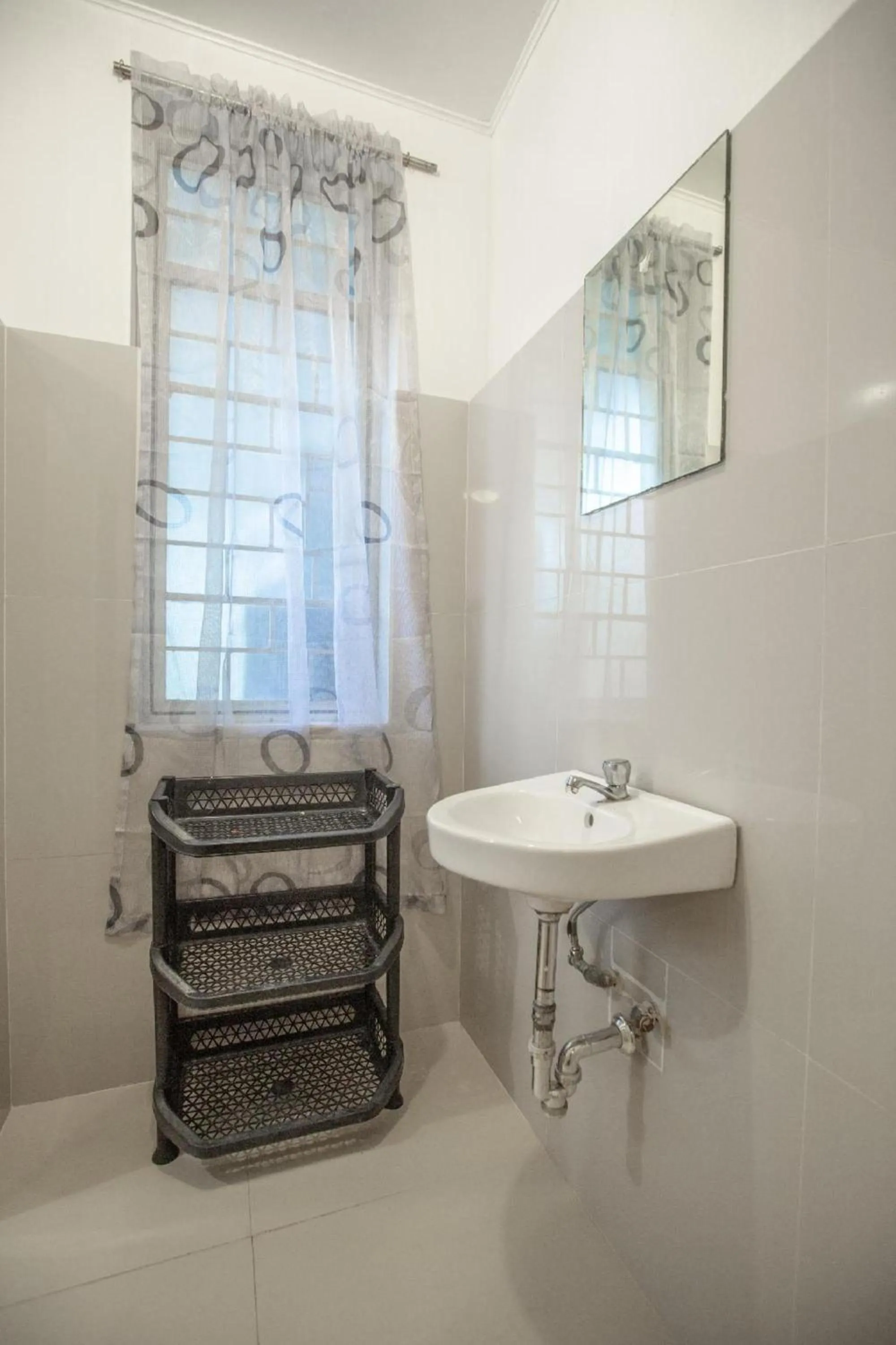 Bathroom in OYO 588 Sunrock Resort