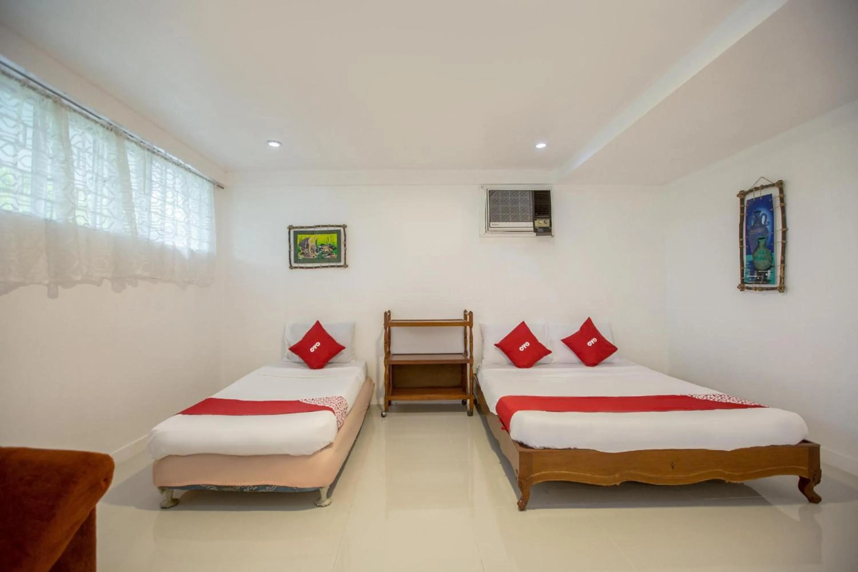 Bedroom, Bed in OYO 588 Sunrock Resort
