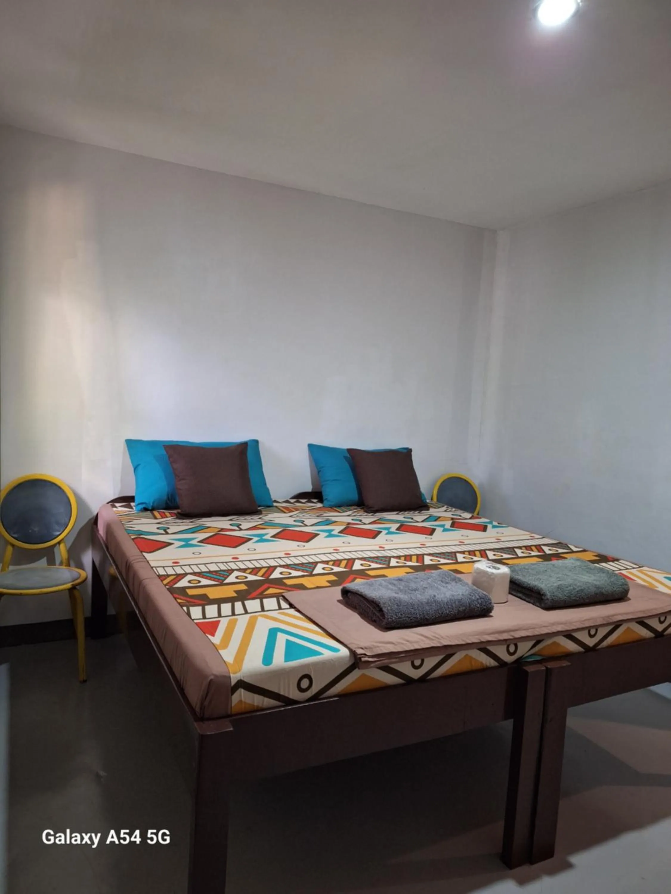 Bed in Rain Haven Lodging House